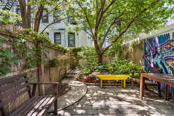 a view of an chairs and tables in the patio