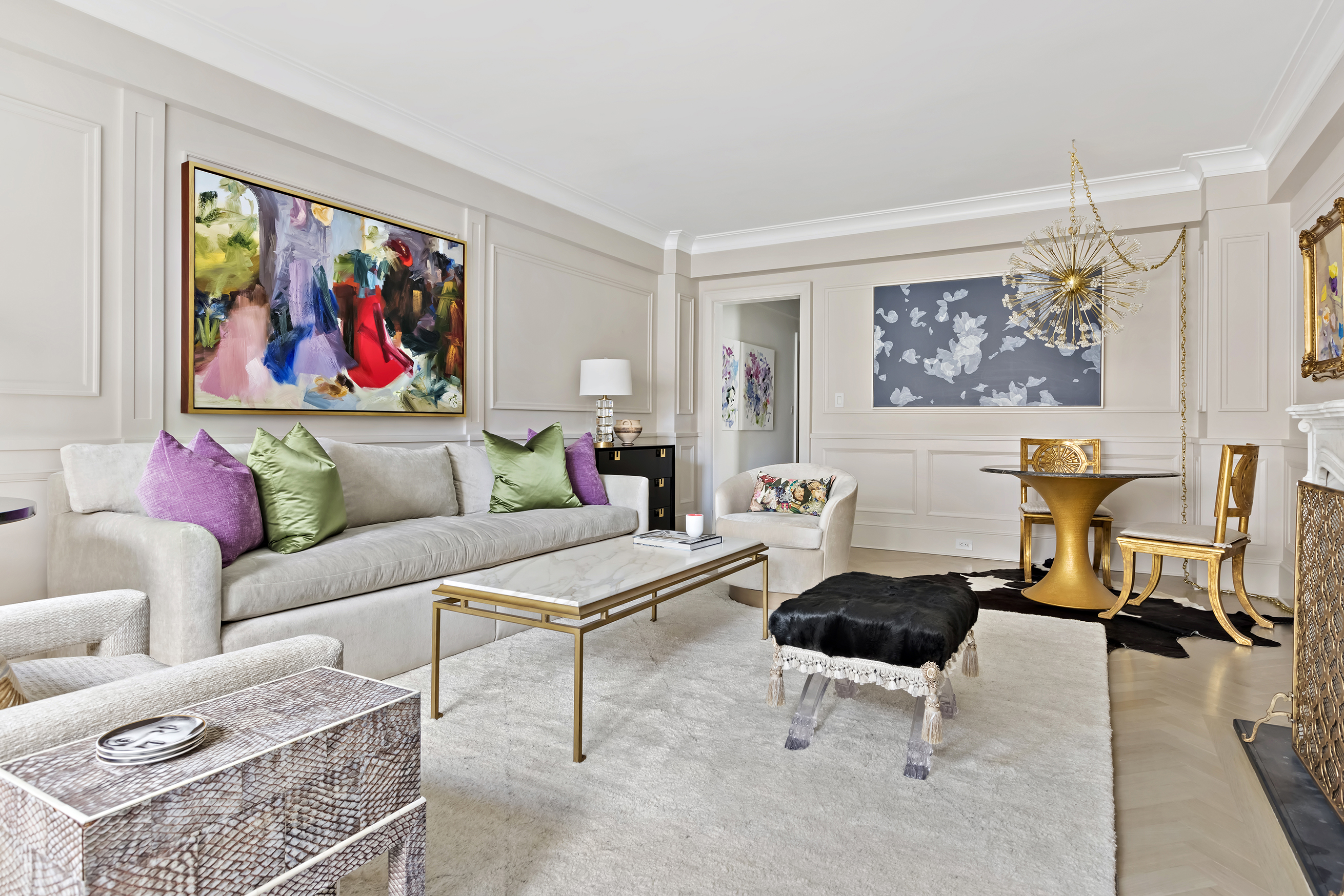 530 Park Avenue, Unit 10D Manhattan, NY 10065 - Photo 5 of 13 a living room with furniture a rug and a wall painting