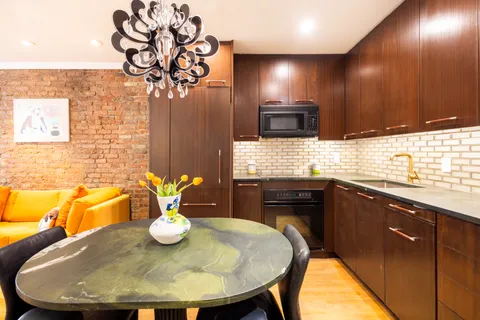 a view of a dining room with furniture