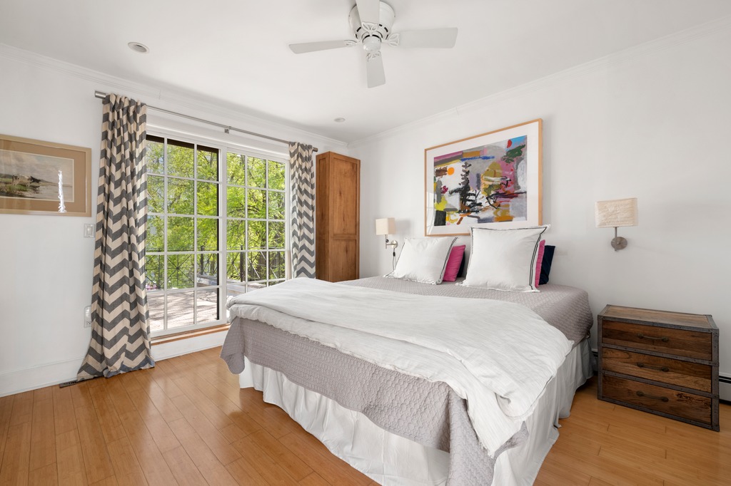 82 Visitation Place, Unit 2 Brooklyn, NY 11231 - Photo 7 of 12 a bedroom with a large bed and a large window
