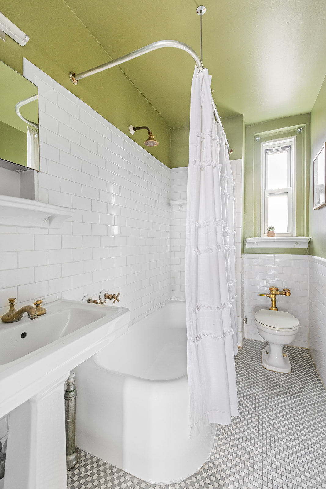 70 Remsen Street, Unit 8F Brooklyn, NY 11201 - Photo 7 of 8 a bathroom with a sink and a mirror
