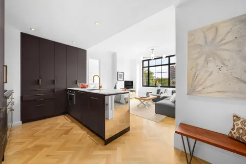 a kitchen with a cabinets and counter space