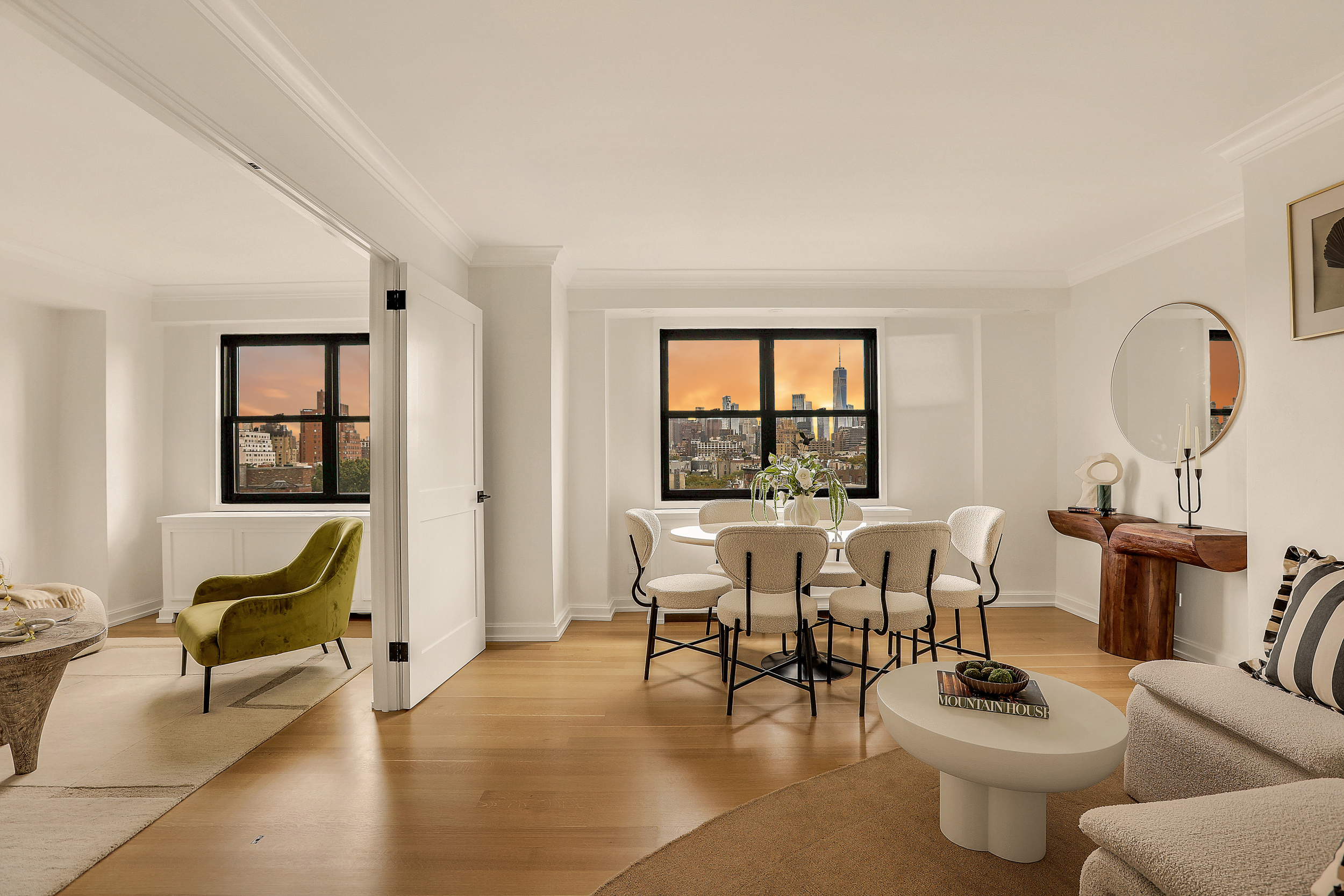 31 Jane Street, Unit 10FG Manhattan, NY 10014 - Photo 6 of 27 a living room with furniture and a window
