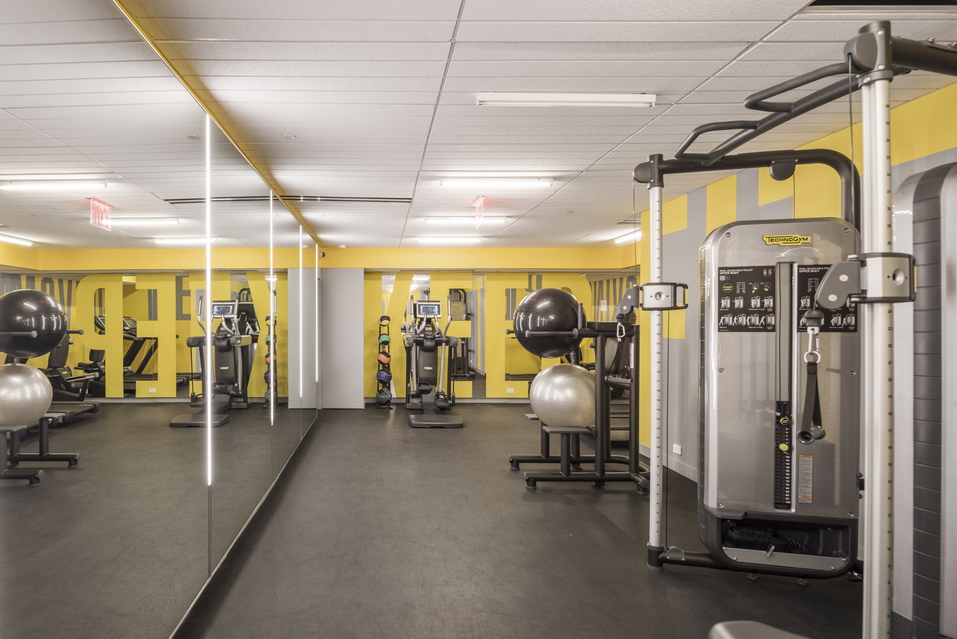 200 East 62nd Street, Unit 27A Manhattan, NY 10065 - Photo 17 of 19 a view of a room with gym equipment