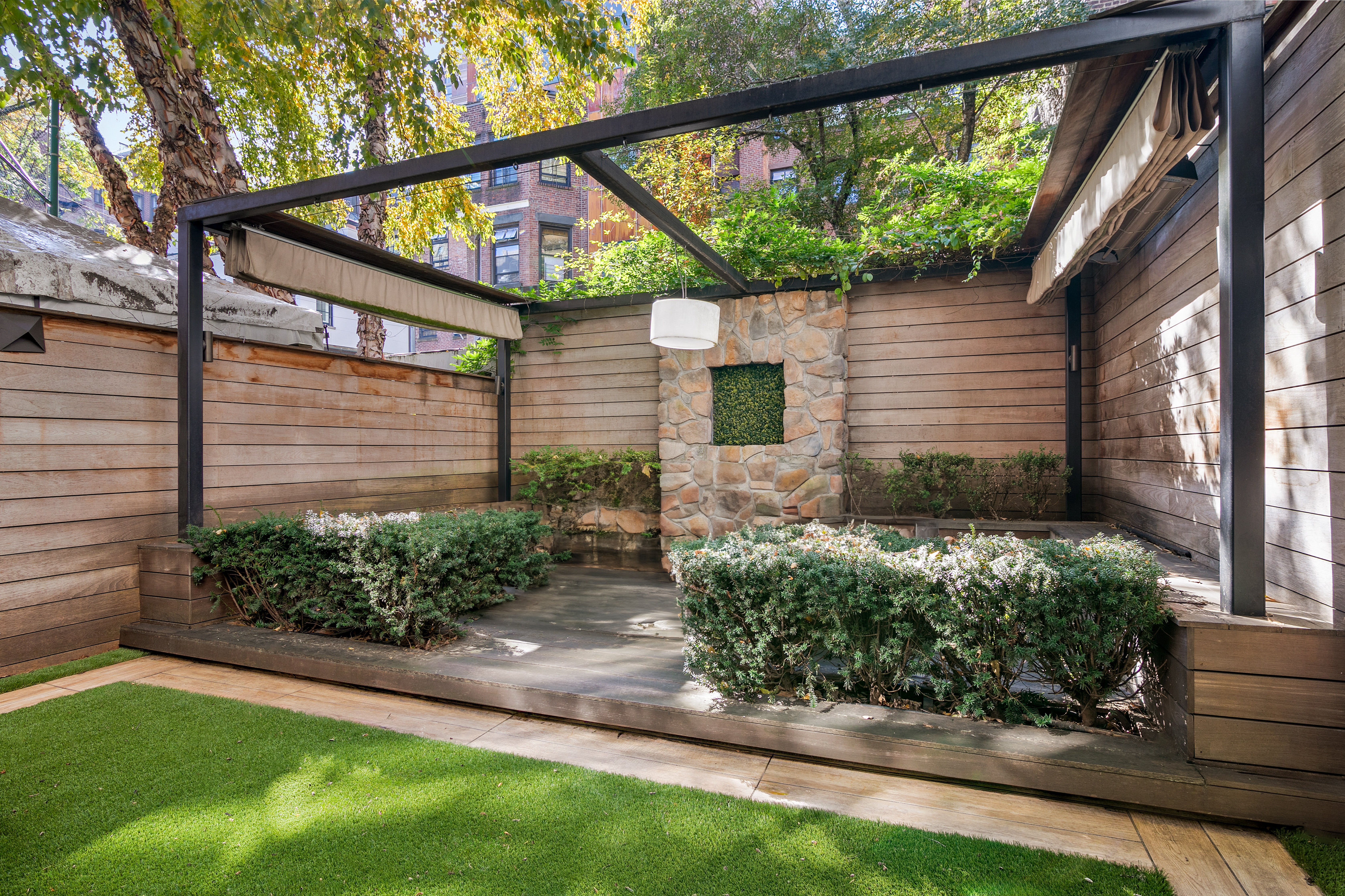 152 West 13th Street Manhattan, NY 10011 - Photo 8 of 28 a view of a house with a yard