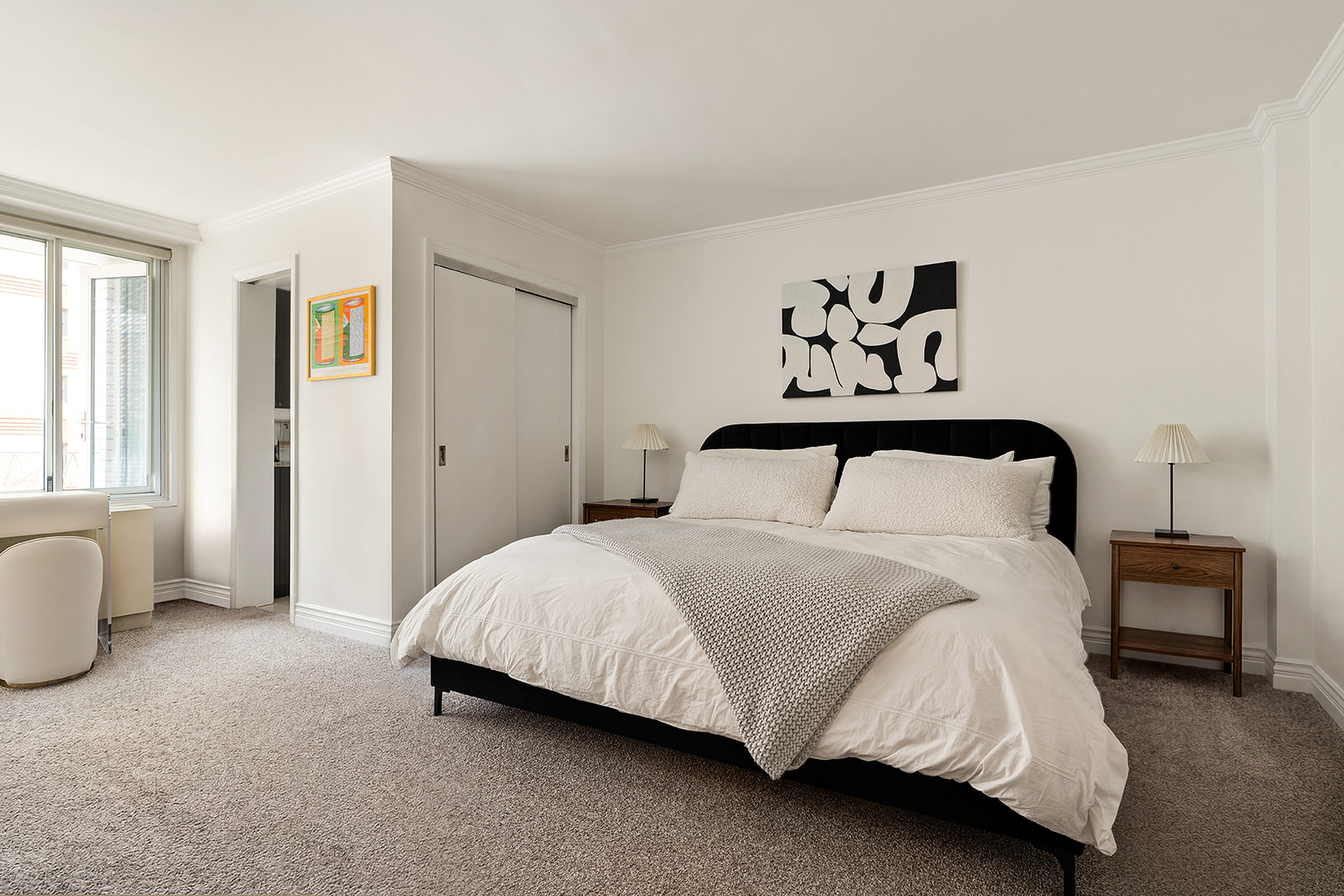 1160 3rd Avenue, Unit 4EF Manhattan, NY 10065 - Photo 4 of 11 a bedroom with a bed and window