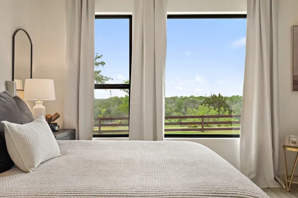 a view of a house with swimming pool and a yard