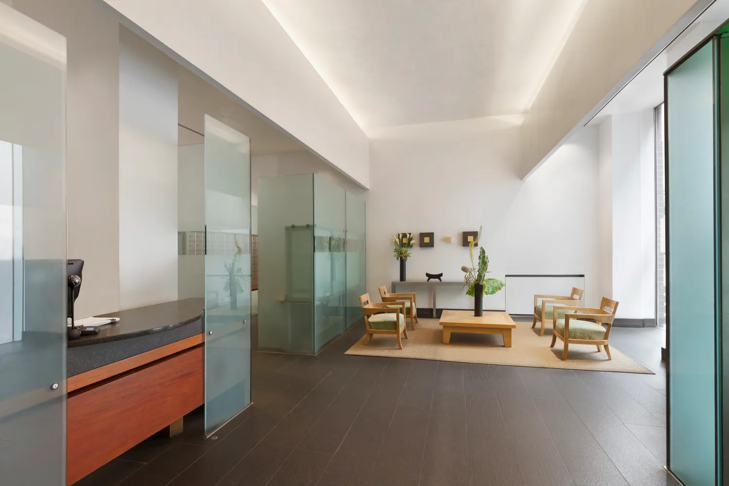 a view of a living room and dining room