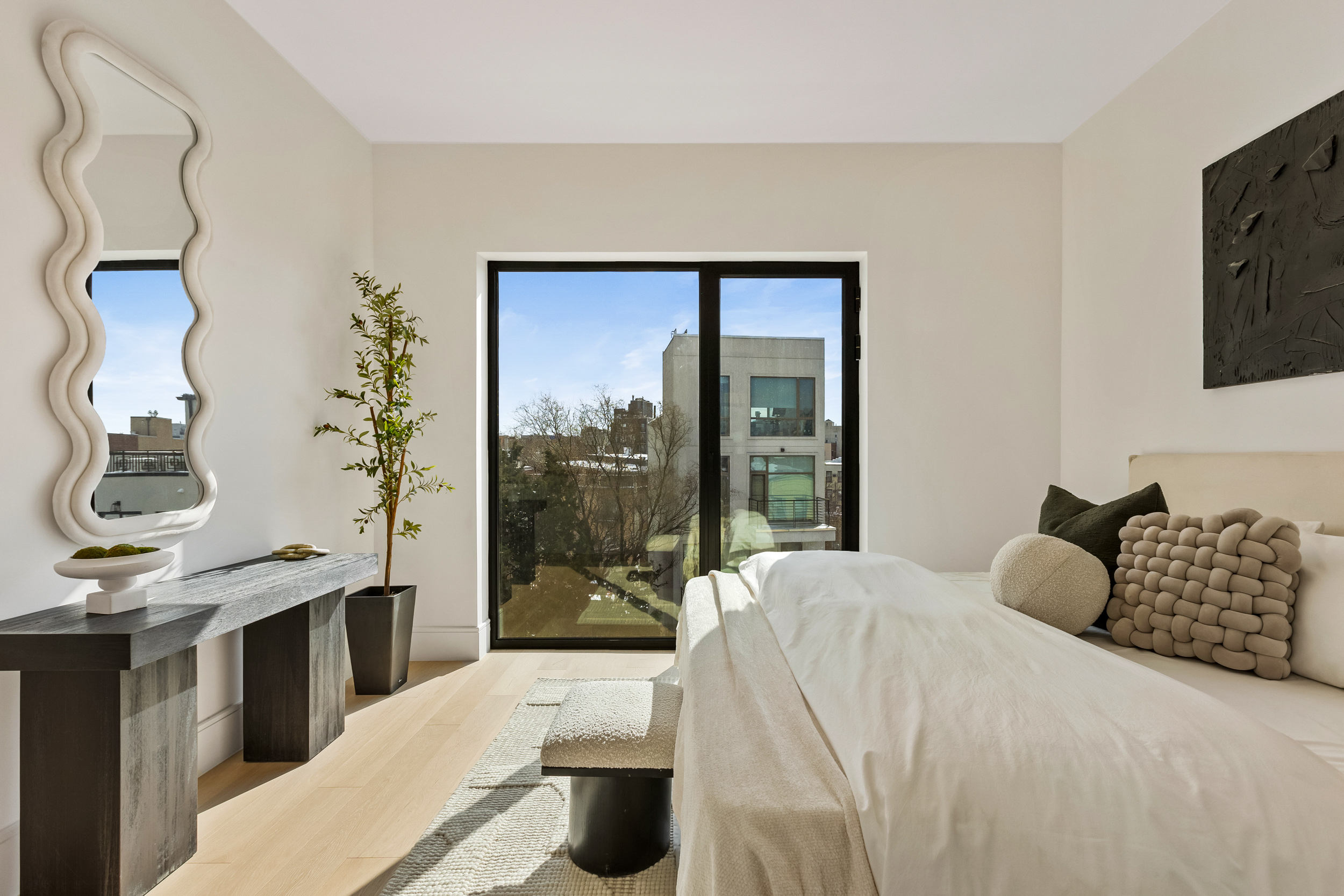 28 Herbert Street, Unit 4C Brooklyn, NY 11222 - Photo 3 of 13 a bedroom with a bed and a window