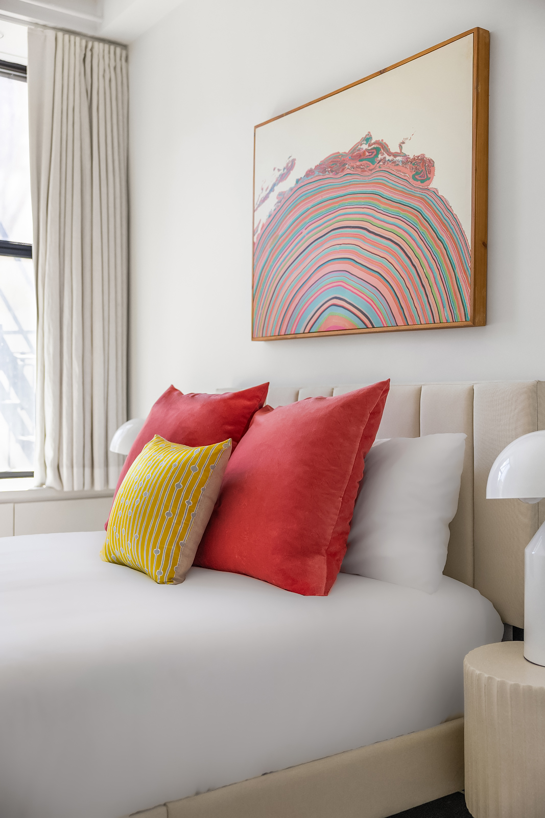 36 West 15th Street, Unit 4 Manhattan, NY 10011 - Photo 18 of 21 a bedroom with a bed and a couch