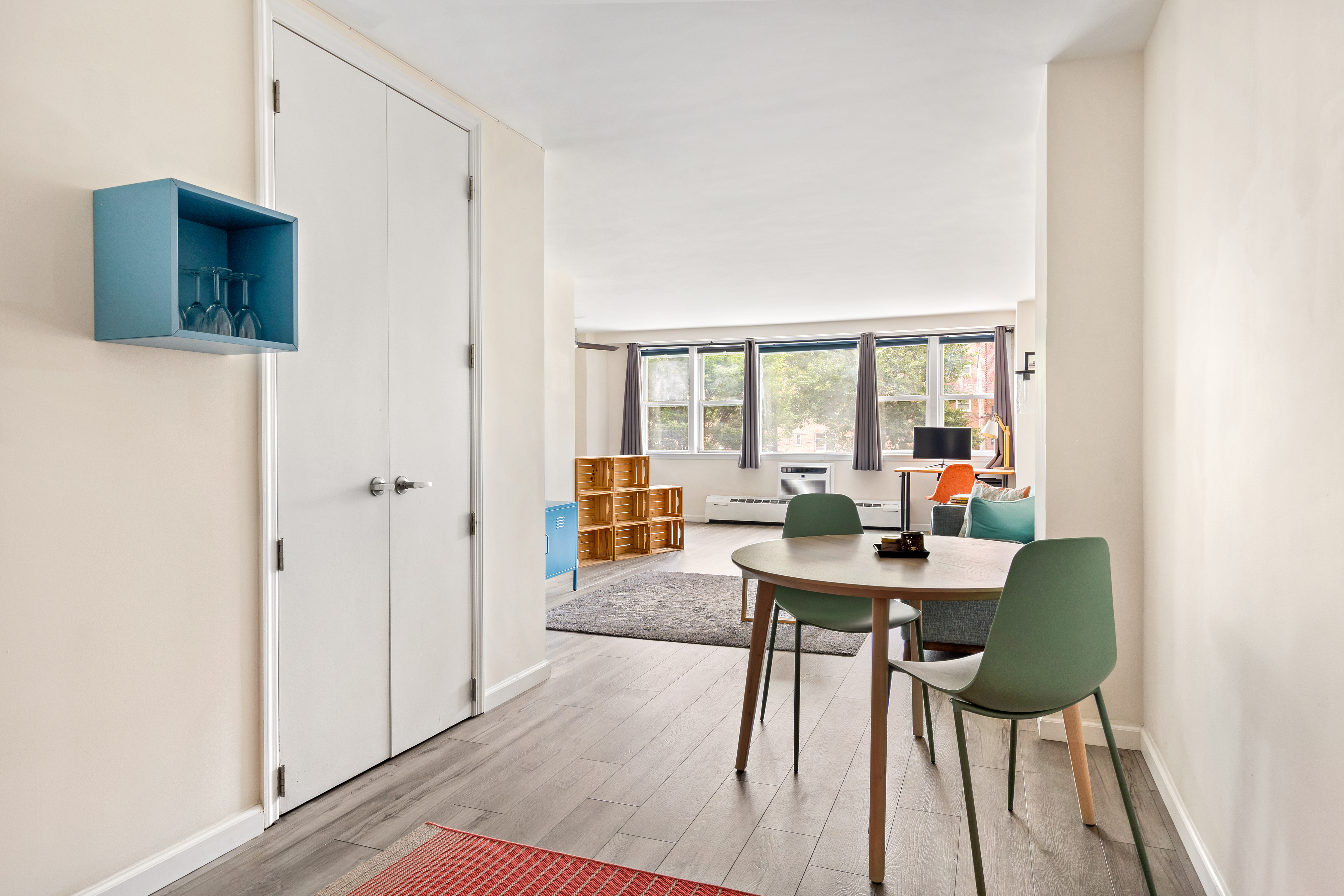 1655 Flatbush Avenue, Unit B210 Brooklyn, NY 11210 - Photo 2 of 5 a workspace with furniture and a large window