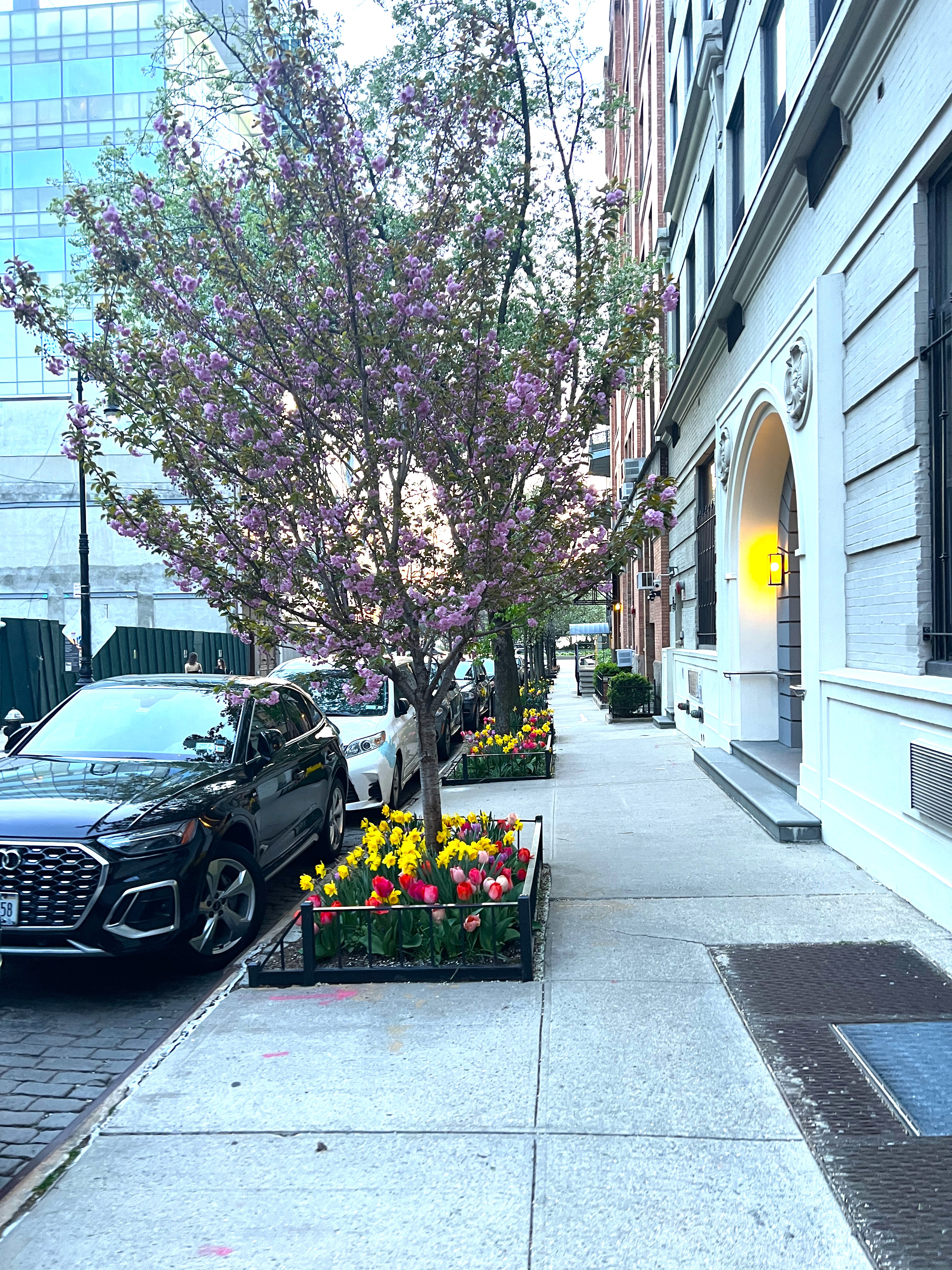 167 Perry Street, Unit 5D Manhattan, NY 10014 - Photo 11 of 18 a view of a street with cars