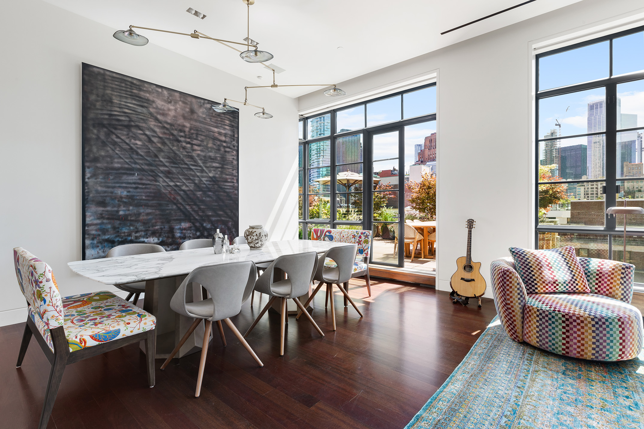 7 Hubert Street, Unit 8A Manhattan, NY 10013 - Photo 6 of 19 a view of a dining room with furniture window and wooden floor