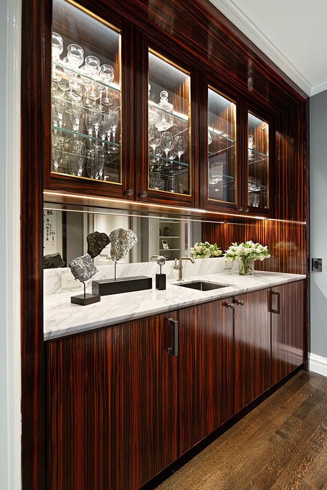 a kitchen with a sink and large window