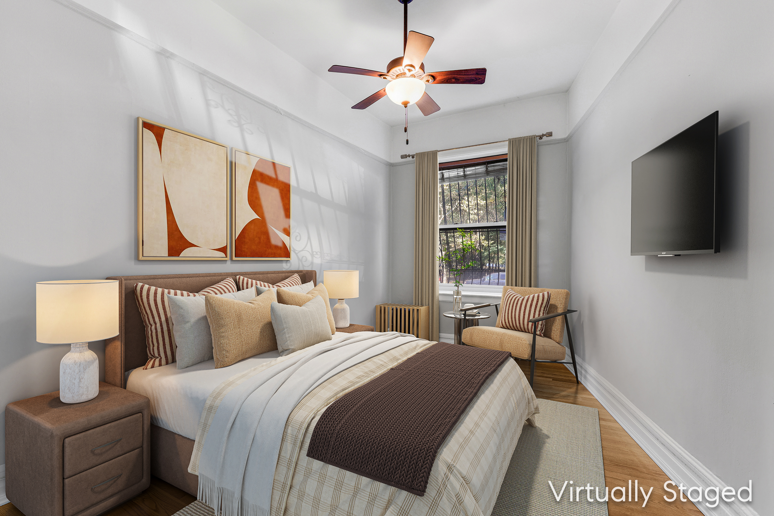 175 Prospect Park Southwest, Unit 1C Brooklyn, NY 11218 - Photo 2 of 12 a bedroom with a bed and a flat screen tv