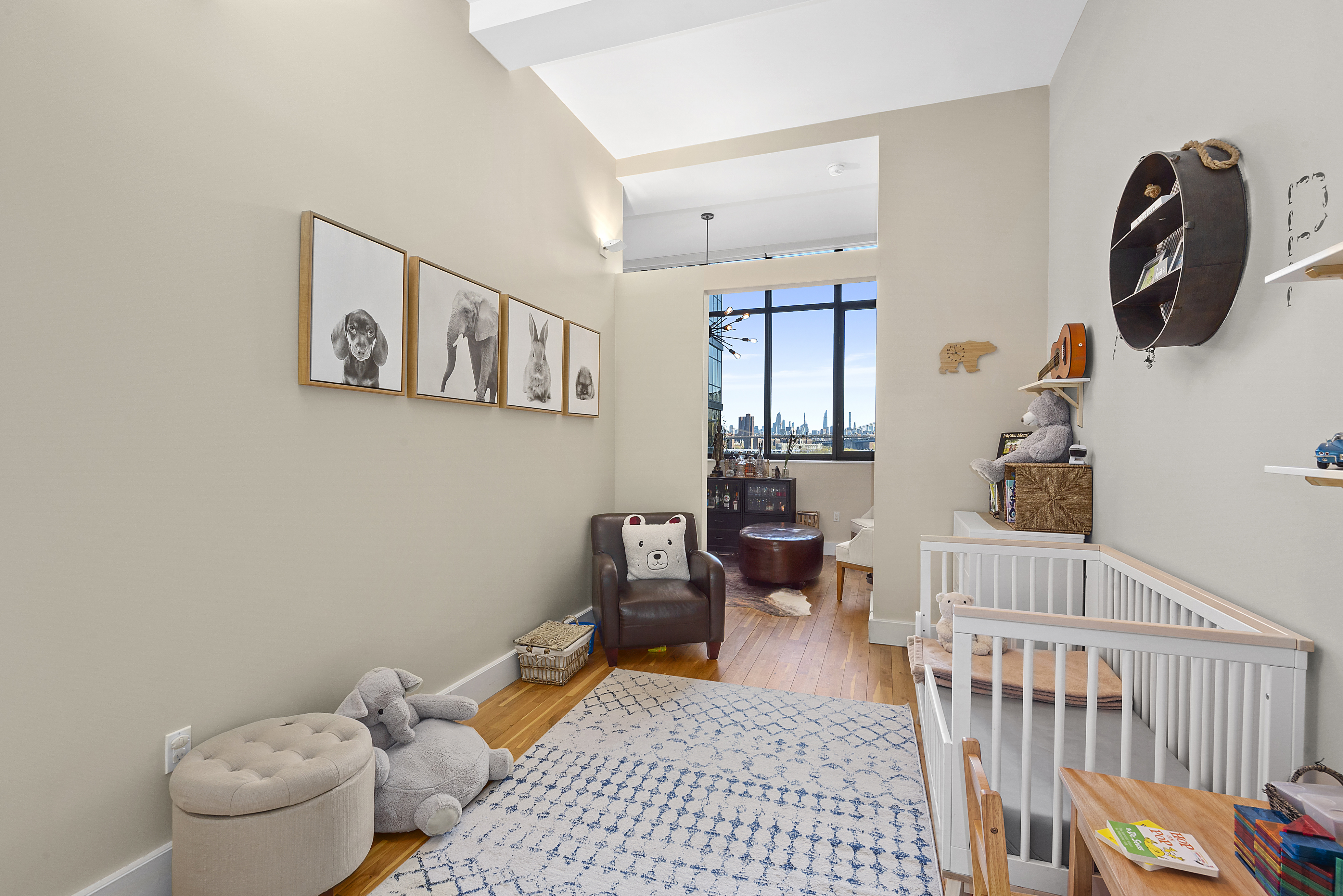 360 Furman Street, Unit 723/724 Brooklyn, NY 11201 - Photo 18 of 63 a bedroom with furniture and a window