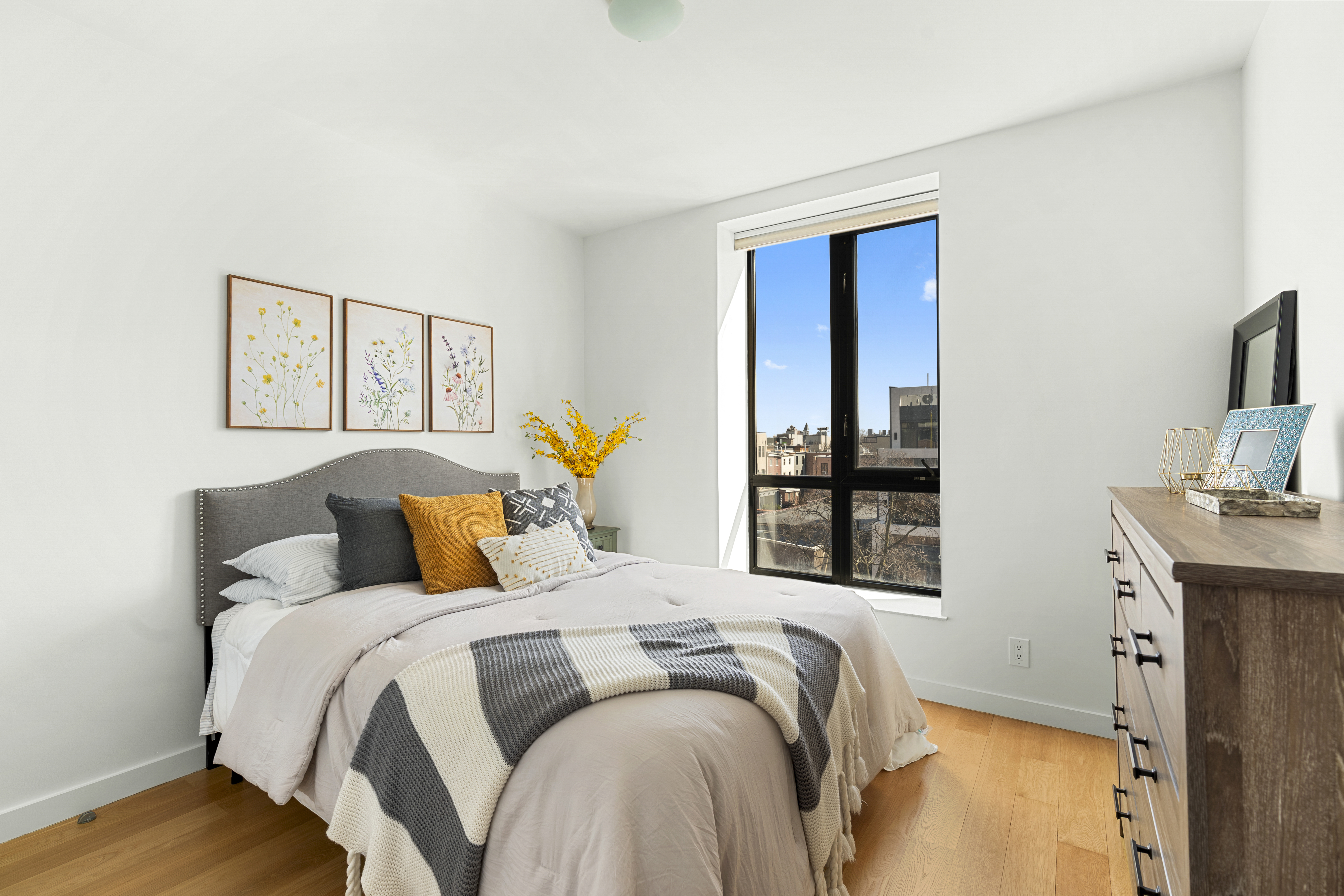 516 Classon Avenue, Unit 4A Brooklyn, NY 11238 - Photo 6 of 9 a bed room with a bed and a window