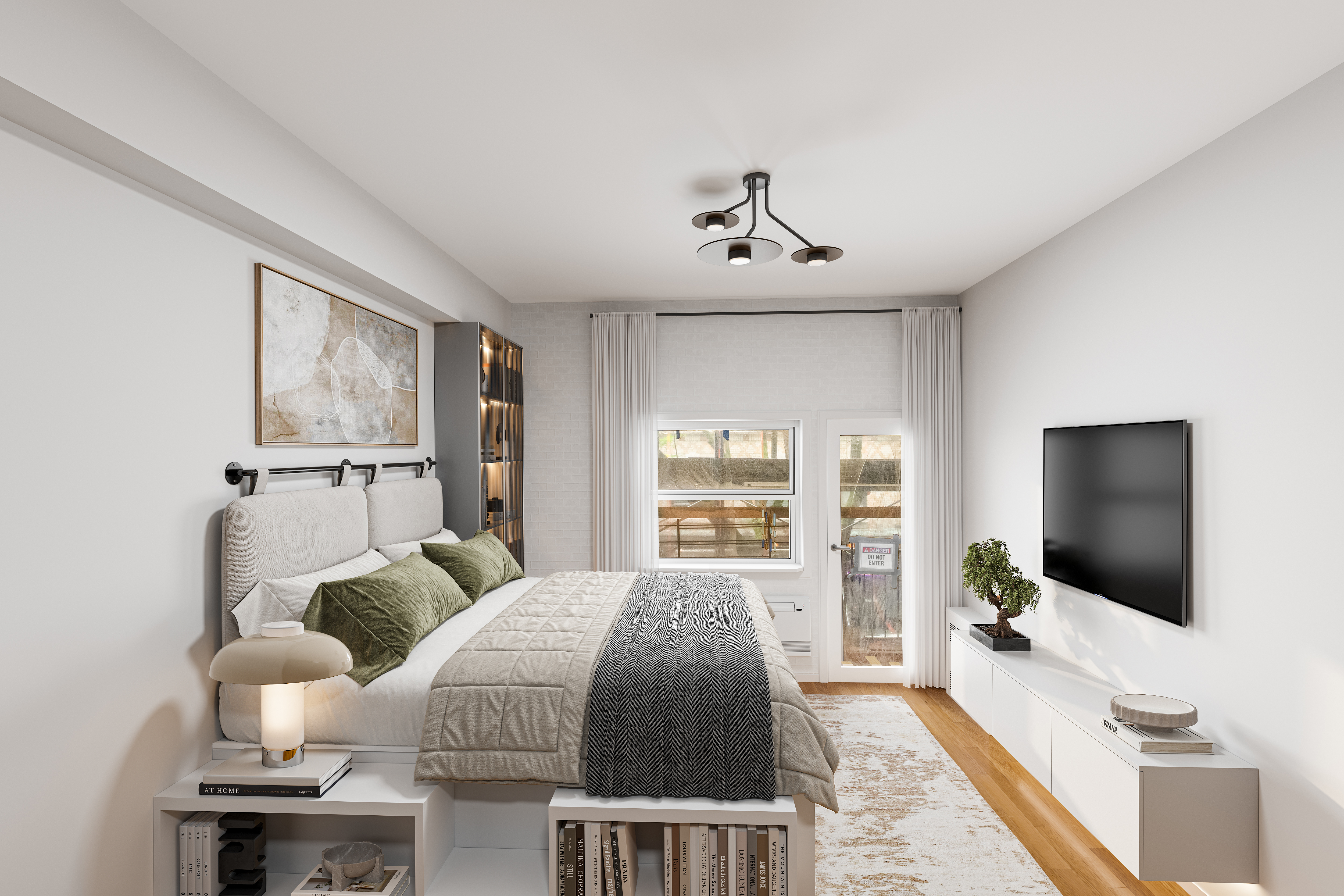 a bedroom with a bed and a flat screen tv