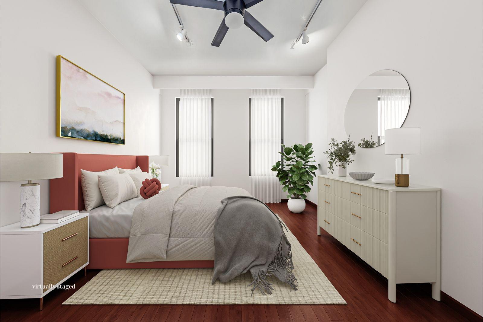 517 East 87th Street, Unit 1 Manhattan, NY 10128 - Photo 4 of 17 a bed room with a bed and a chandelier