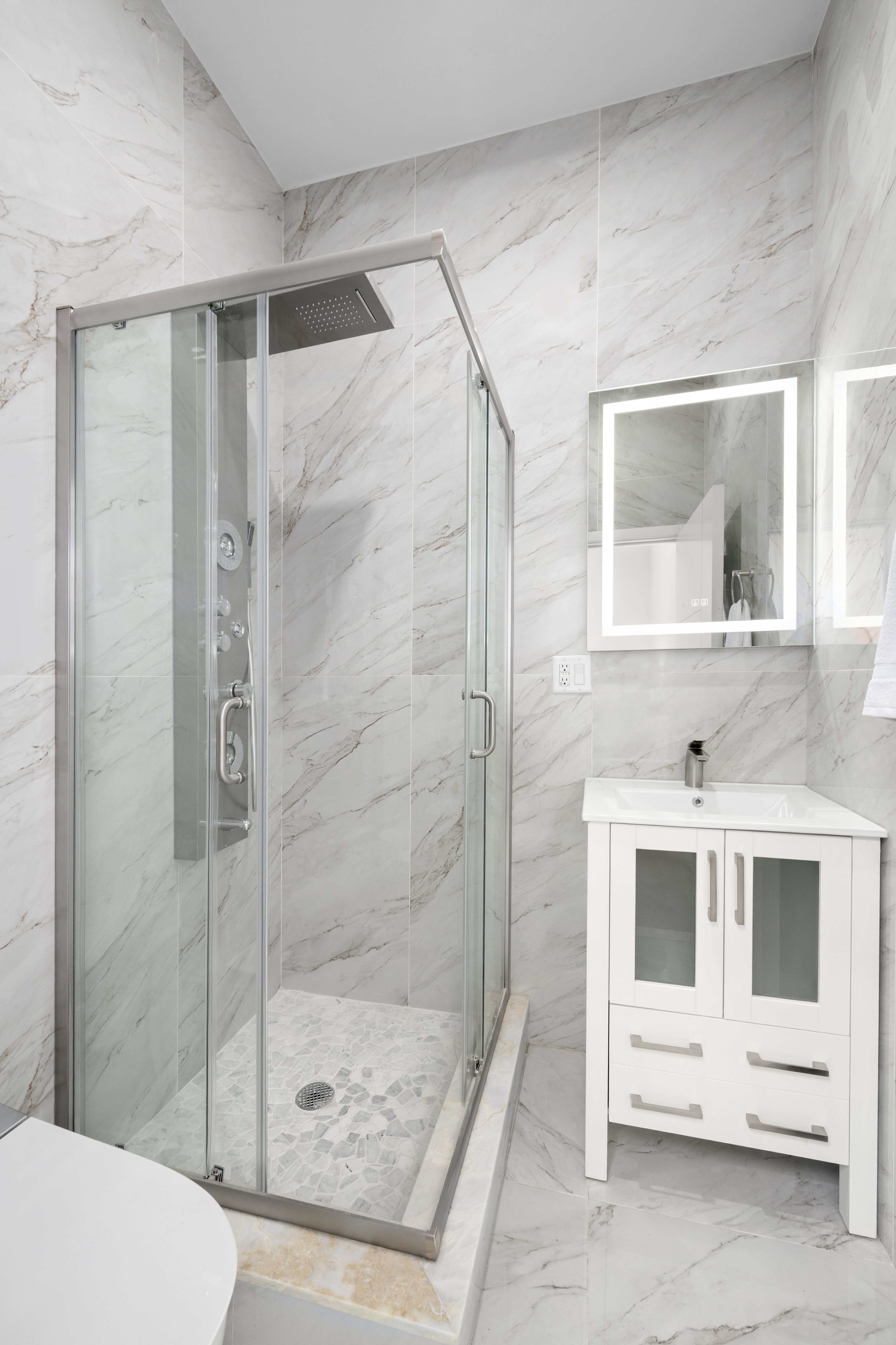 84 Himrod Street Brooklyn, NY 11221 - Photo 17 of 35 a bathroom with a shower and a sink