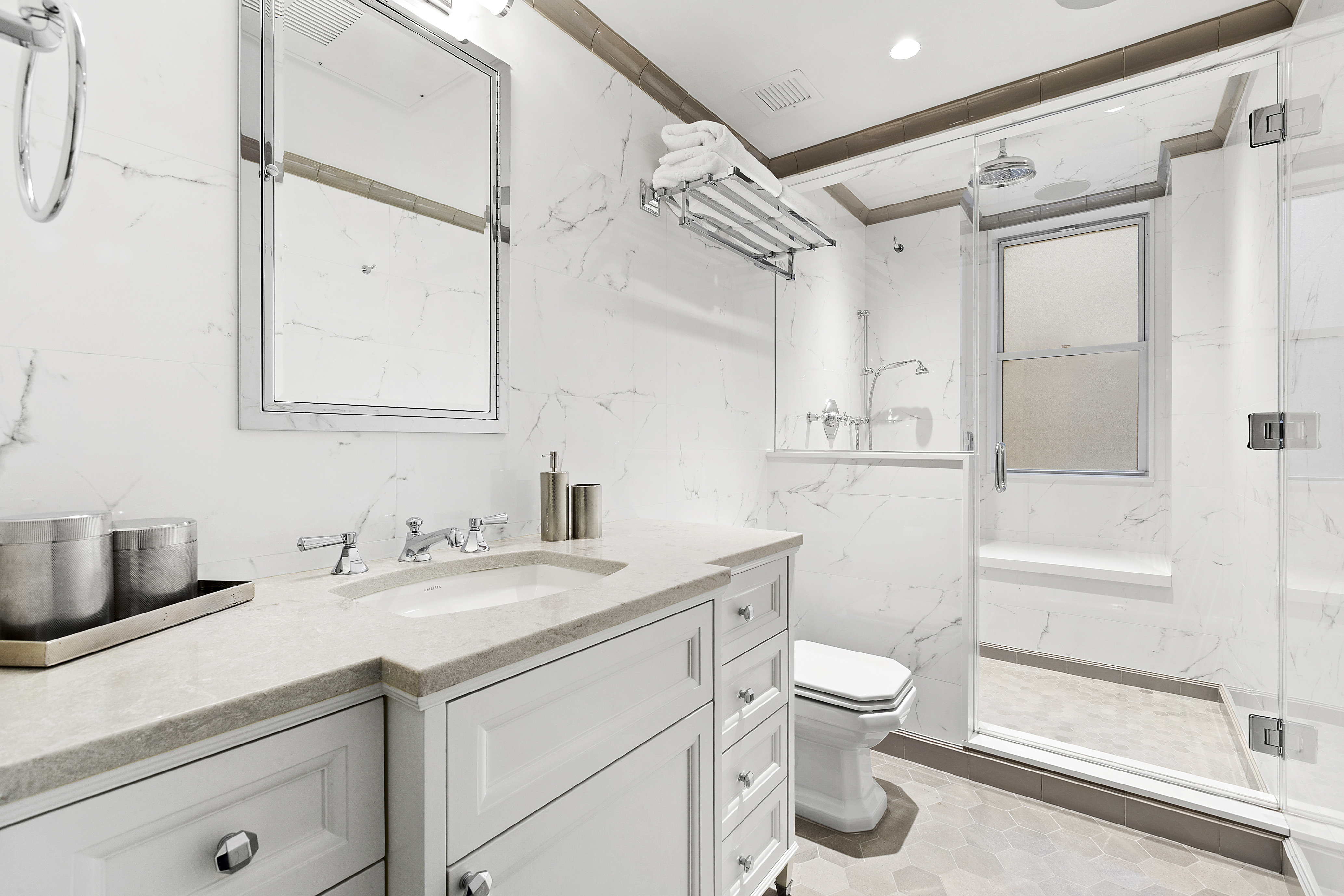 15 West 81st Street, Unit 4E Manhattan, NY 10024 - Photo 11 of 18 a bathroom with a granite countertop sink toilet a mirror and shower