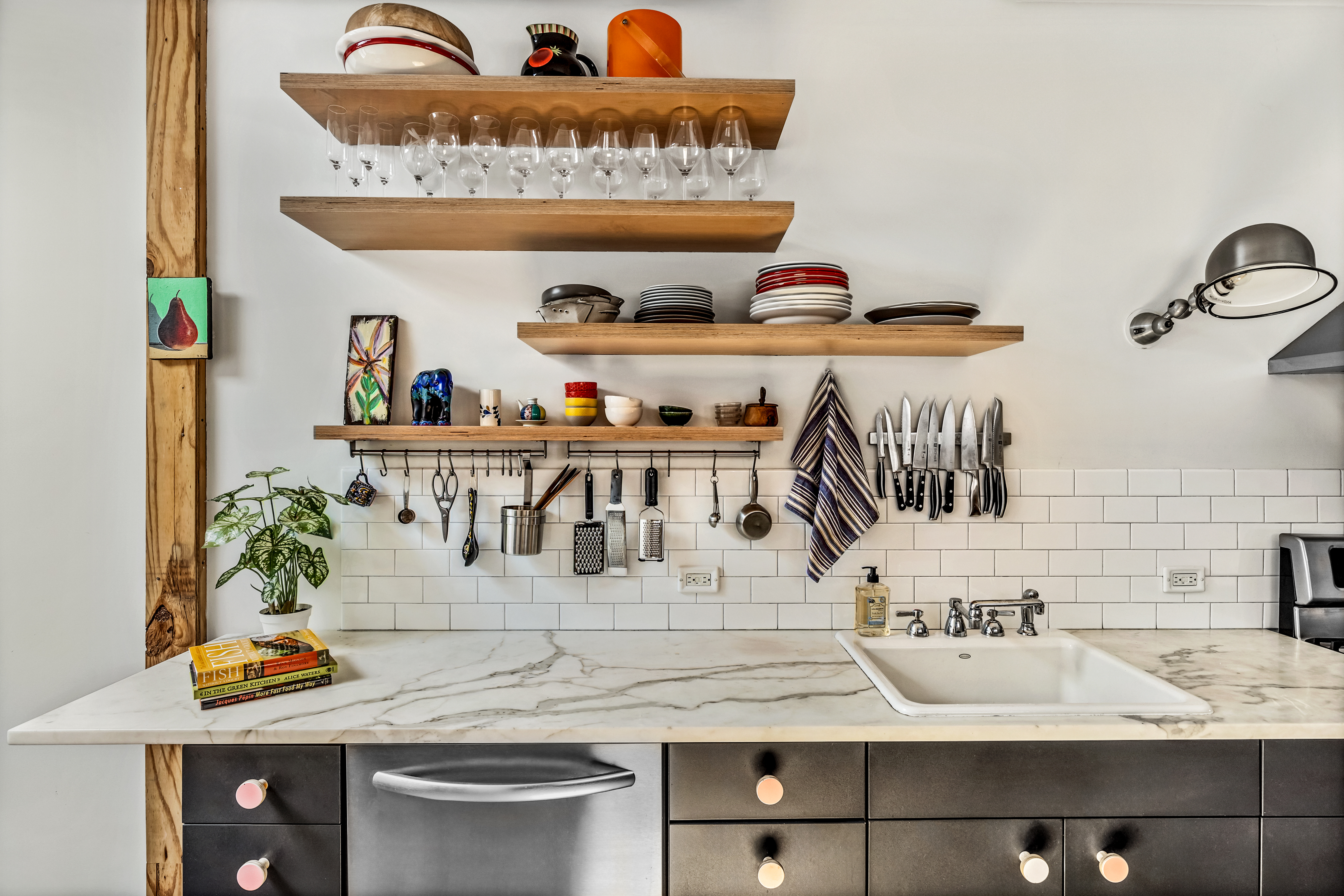 162 10th Street Brooklyn, NY 11215 - Photo 2 of 13 a kitchen with a stove and cabinets