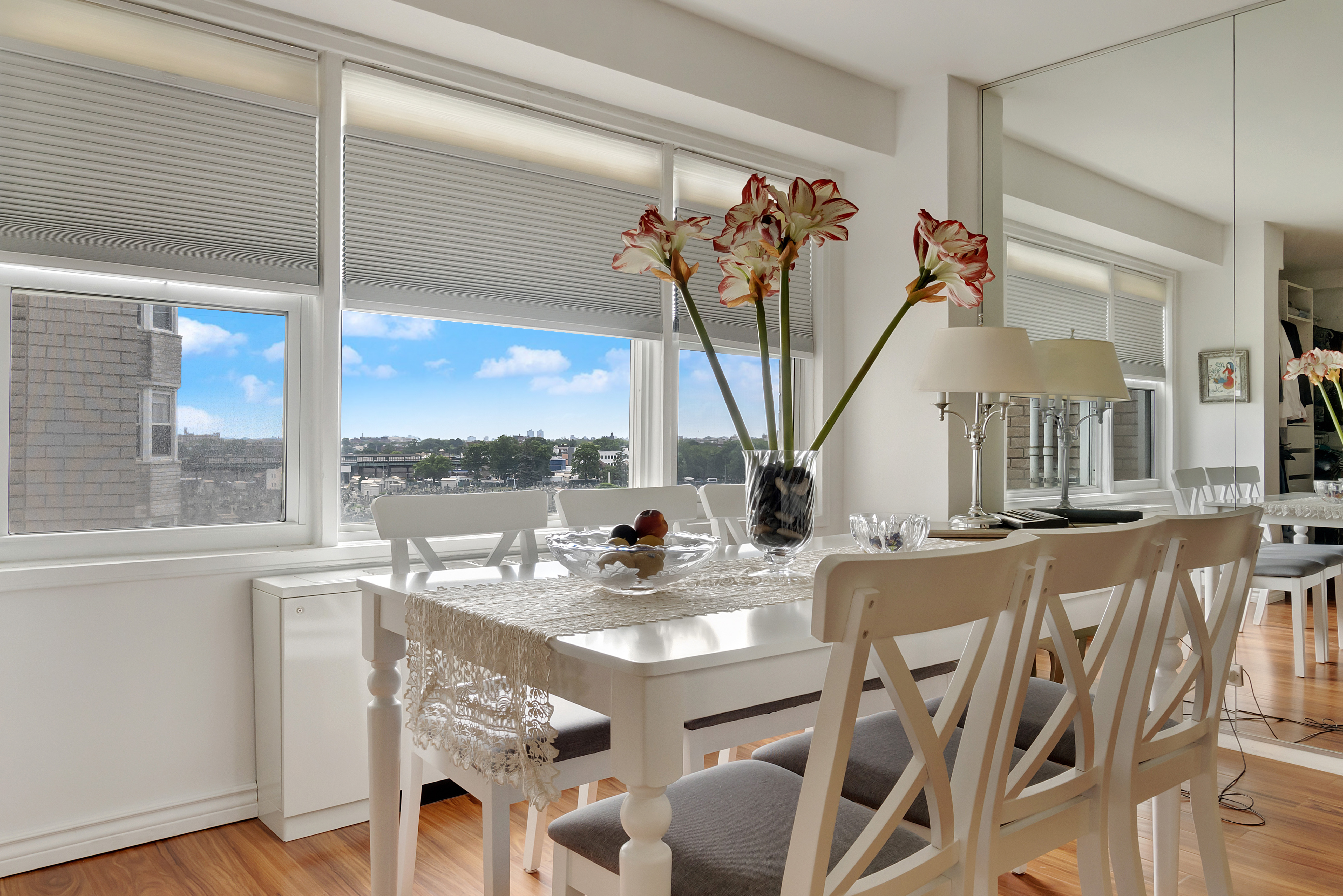 1170 Ocean Parkway, Unit 7A Brooklyn, NY 11230 - Photo 3 of 13 a view of a dining room with furniture window and wooden floor