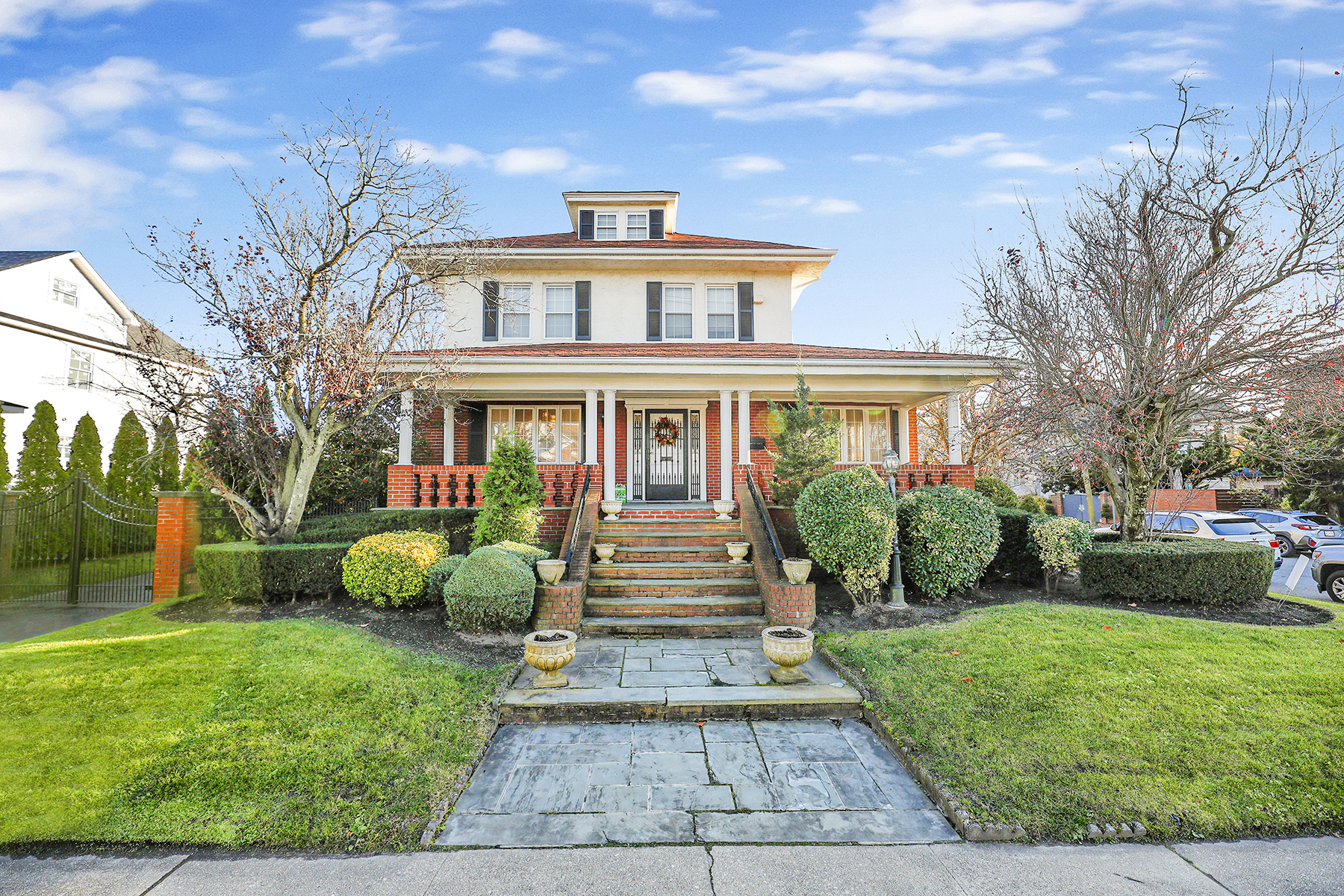 142-15 Newport Avenue Queens, NY 11694 - Photo 45 of 72 a front view of a house with garden and plants
