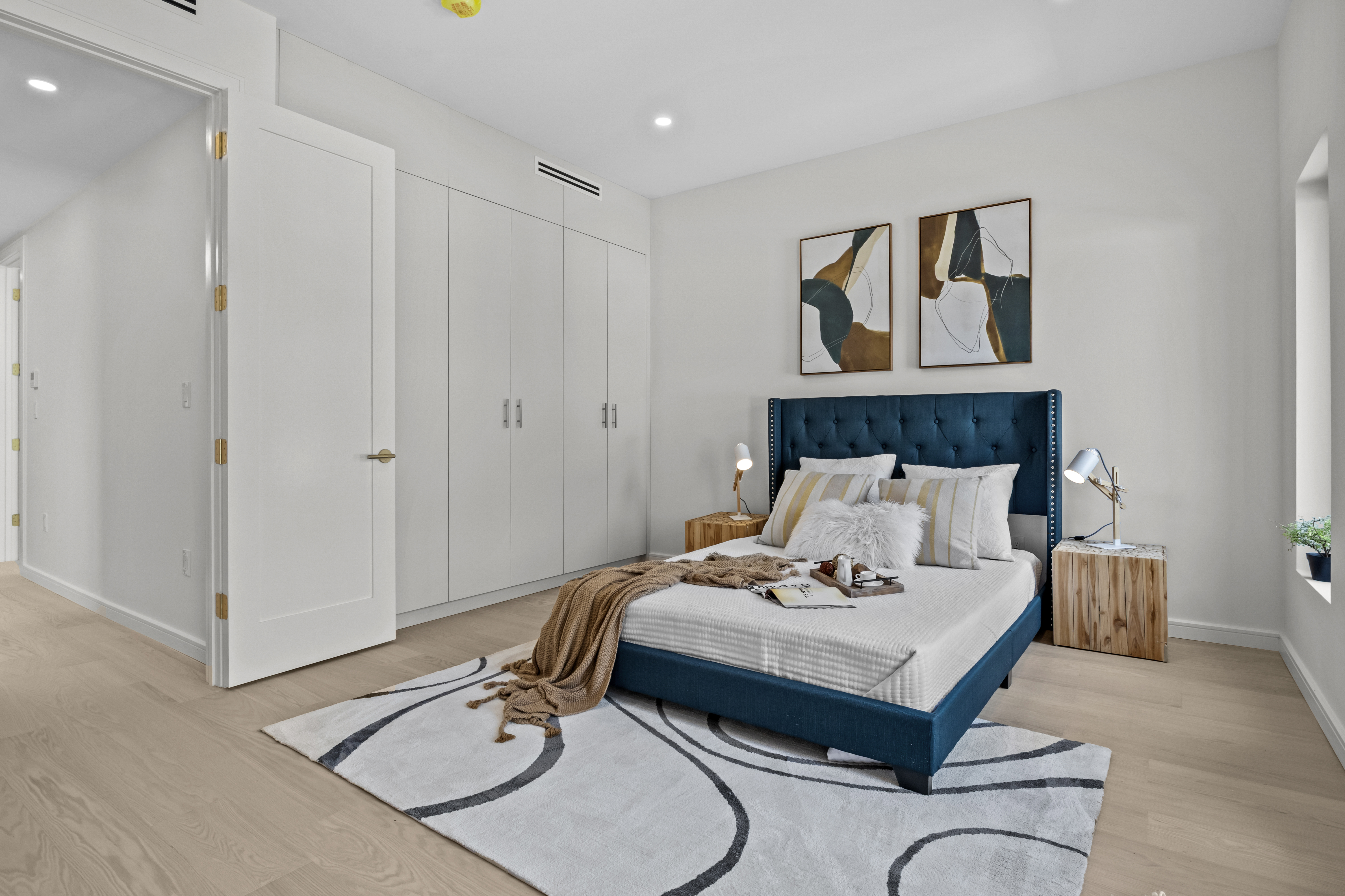 320 10th Street Brooklyn, NY 11215 - Photo 21 of 41 a bedroom with a bed and wooden floor