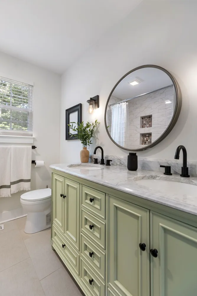 a view of a patio with table and chairs potted plants and a palm tree