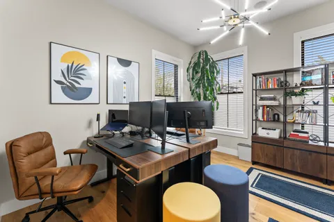 a view of a livingroom with furniture and window