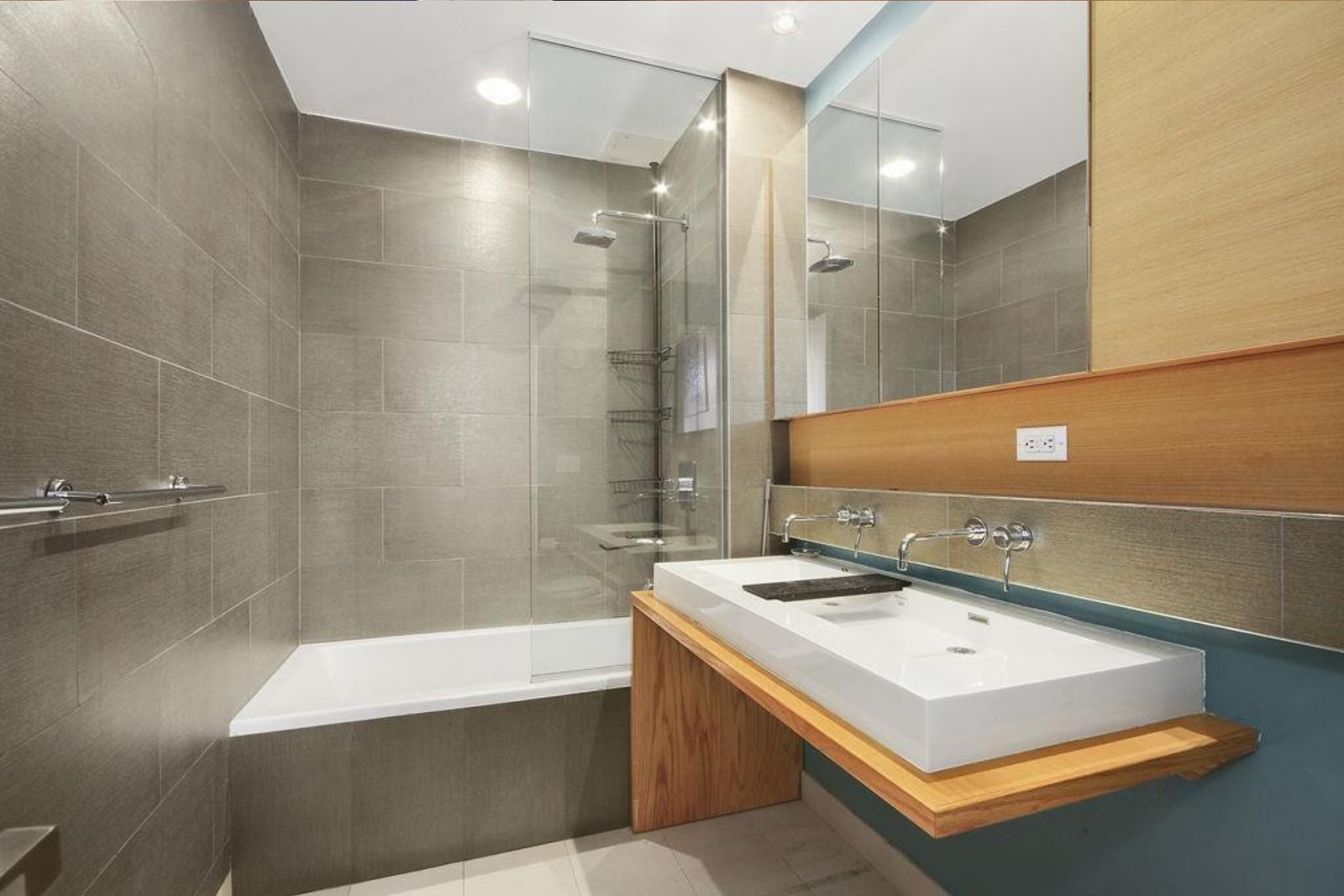 342 East 110th Street, Unit 5D Manhattan, NY 10029 - Photo 4 of 5 a bathroom with a bathtub and a sink