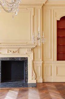 a view of a fireplace with wooden floor