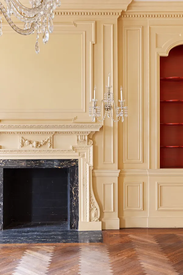 a view of a fireplace with wooden floor
