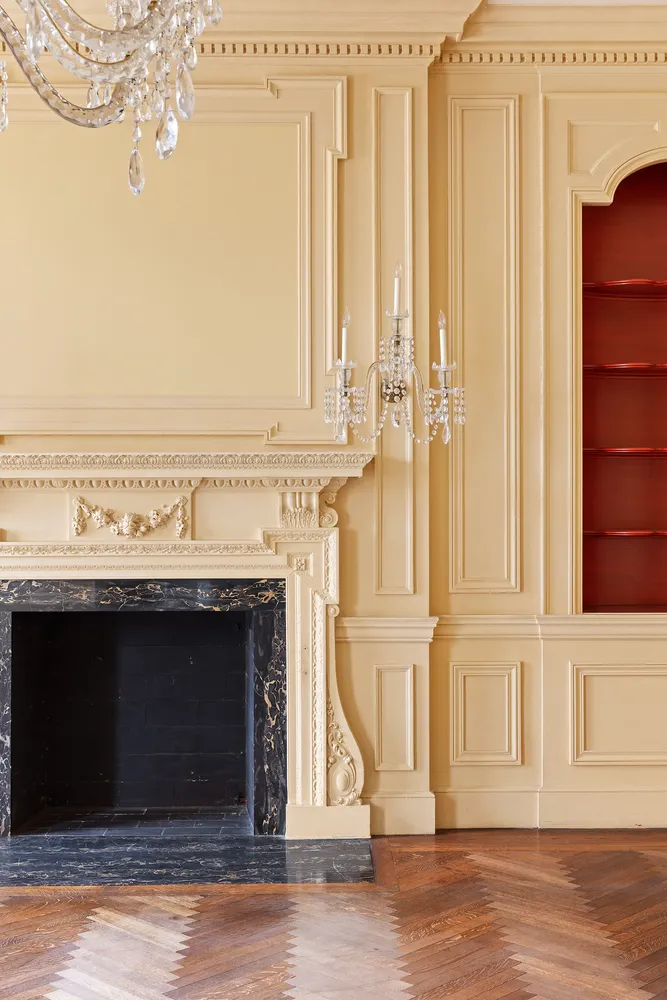 a view of a fireplace with wooden floor