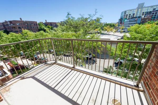 a view of a balcony with lake view