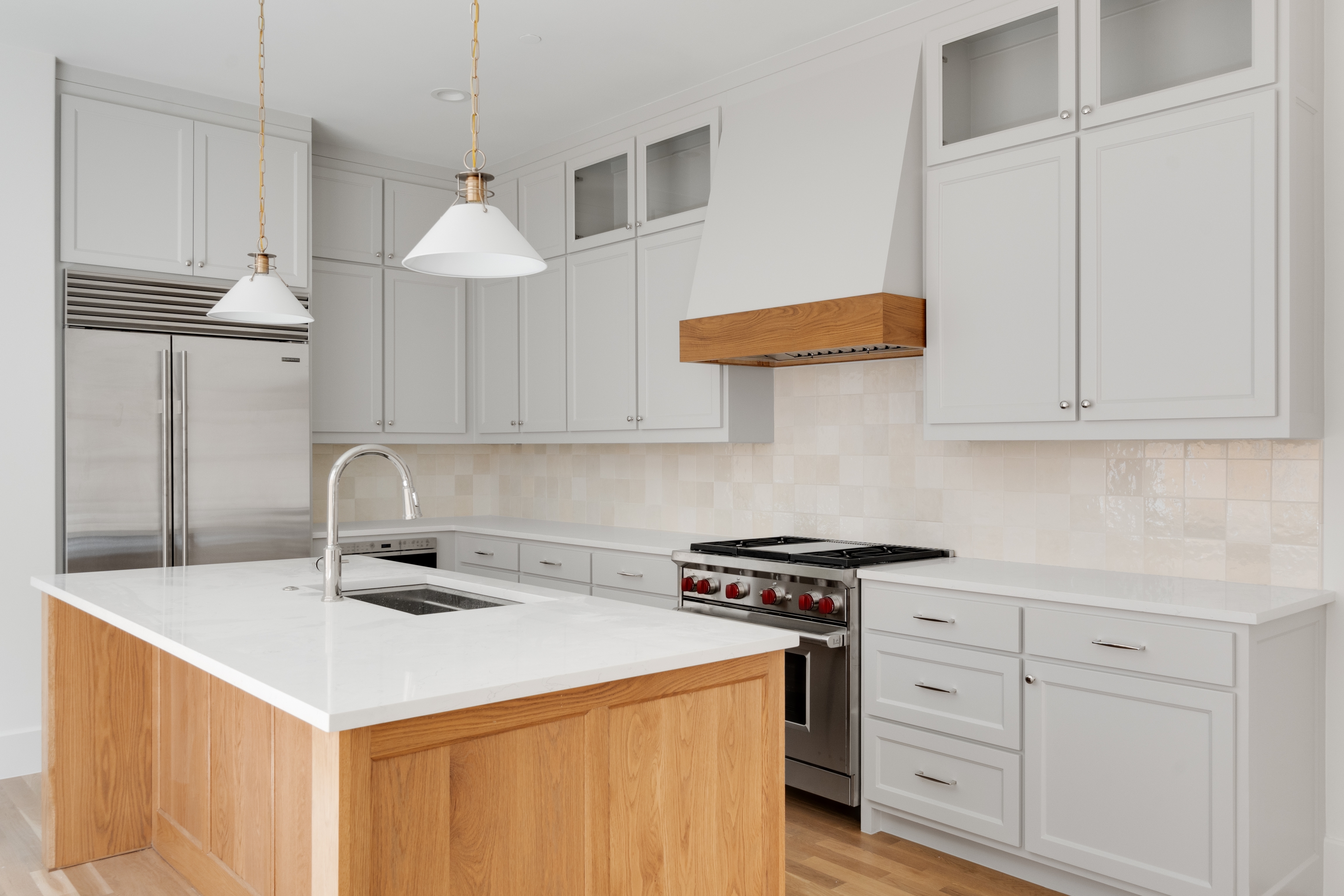4410 Glenwick Lane Dallas, TX 75205 - Photo 9 of 28 a kitchen with stainless steel appliances granite countertop a sink a stove and a refrigerator