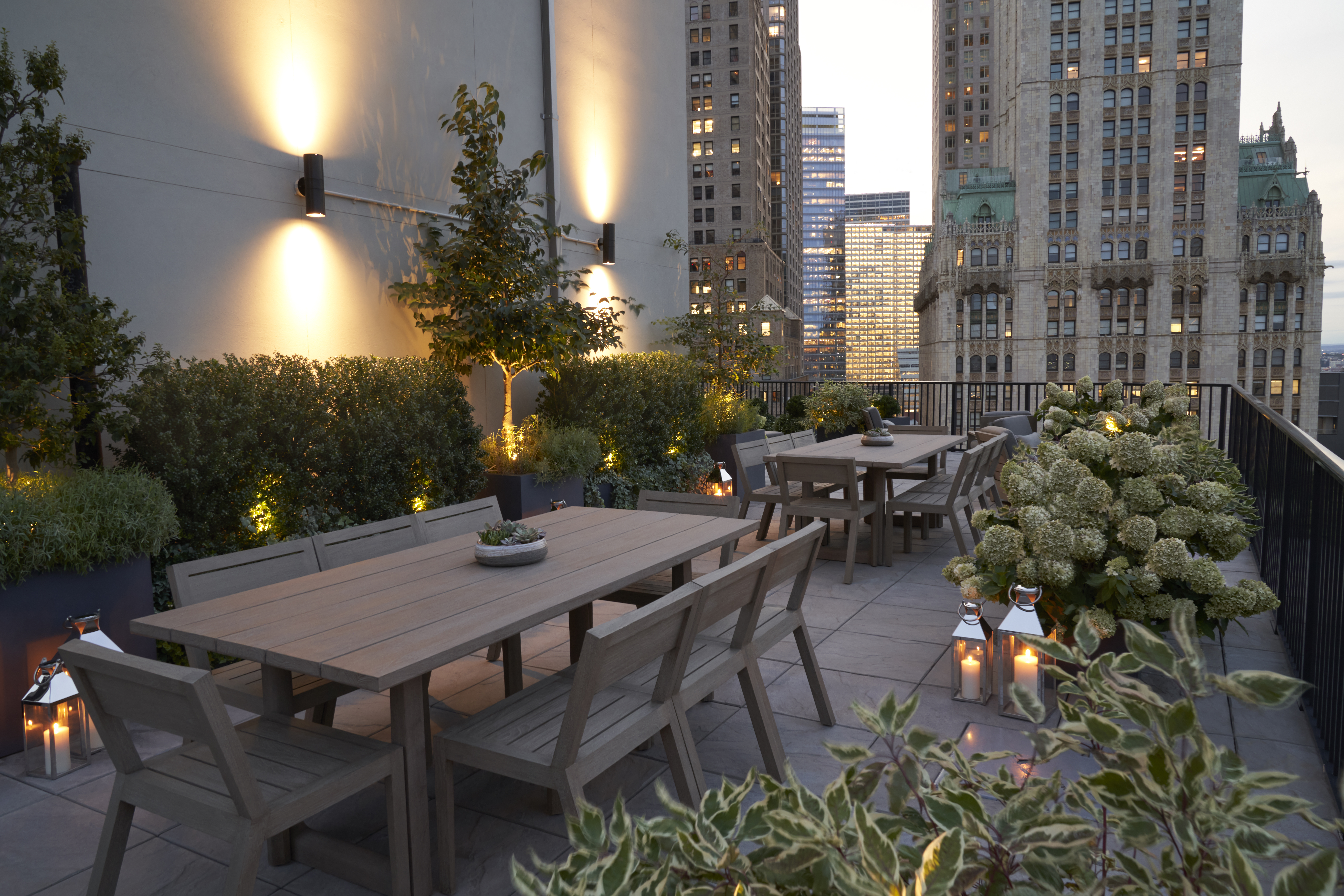 33 Park Row, Unit 6B Manhattan, NY 10038 - Photo 16 of 20 a view of a patio with table and chairs and potted plants