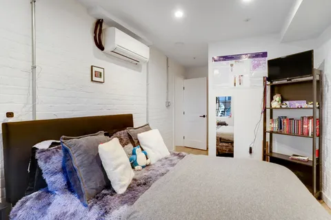 a bathroom with a sink and a shower