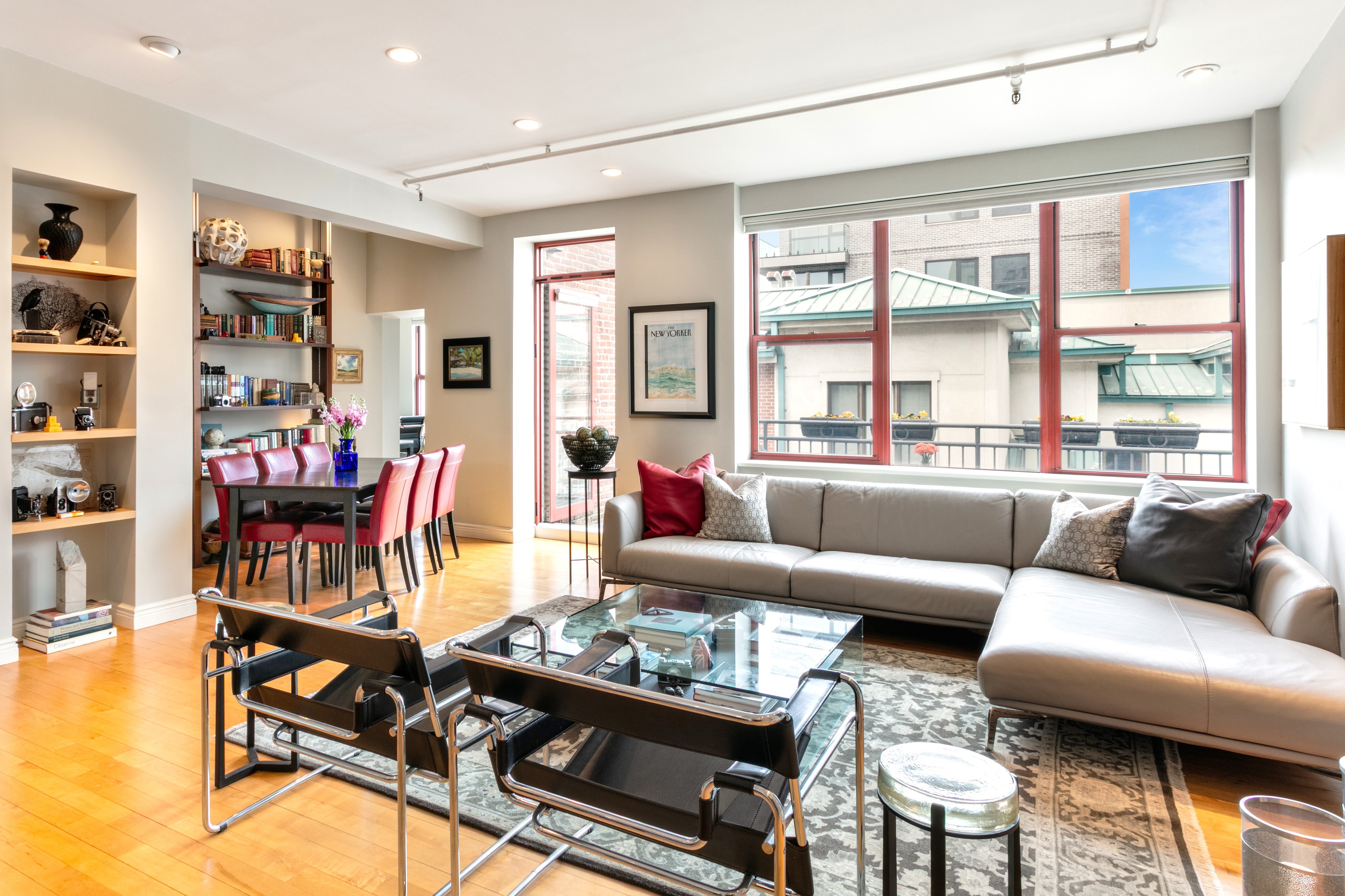 60 Tiffany Place, Unit 3C Brooklyn, NY 11231 - Photo 1 of 10 a living room with furniture and a window