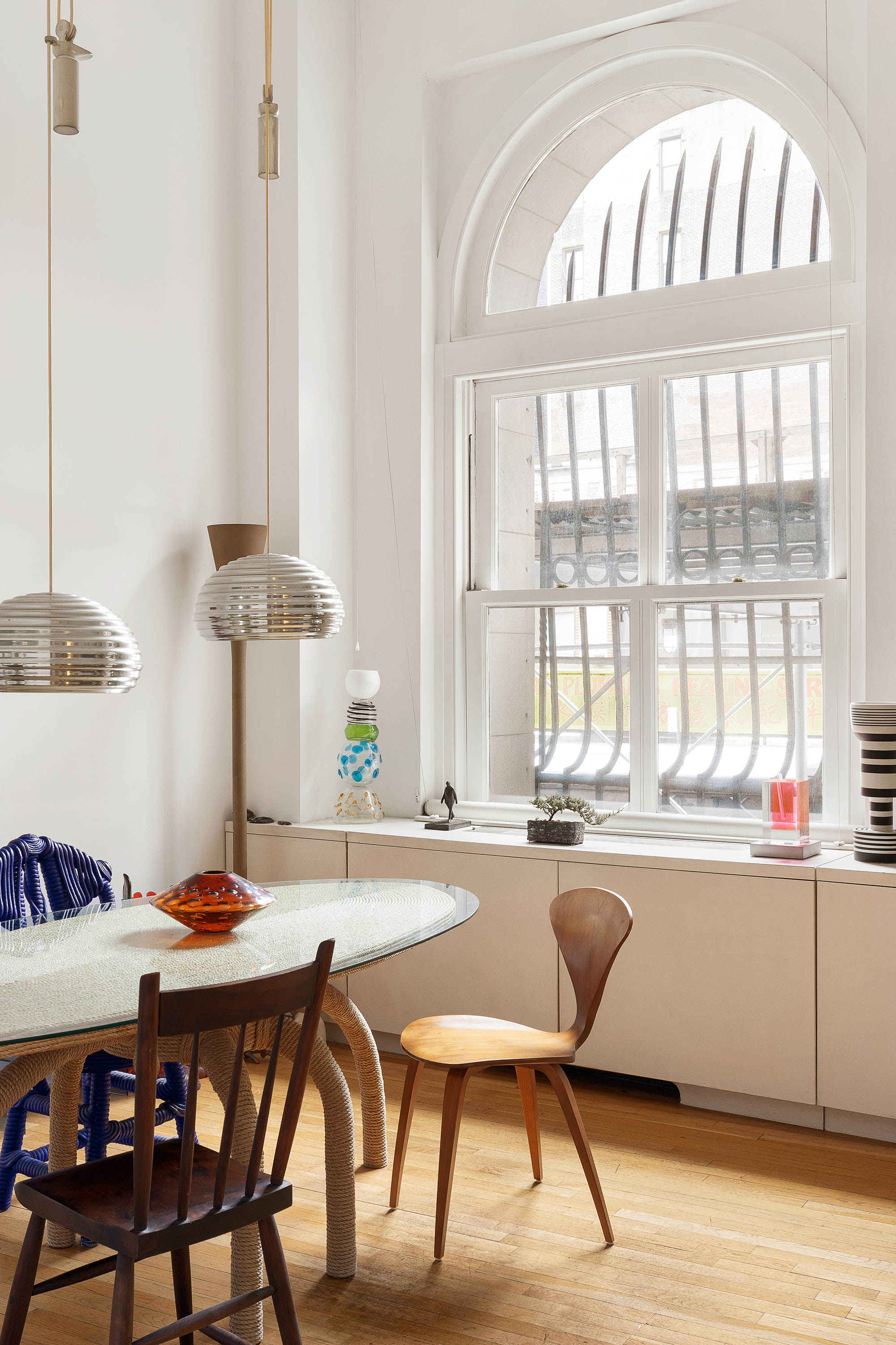 240 Centre Street, Unit 2B Manhattan, NY 10013 - Photo 4 of 12 a dining room with furniture and window
