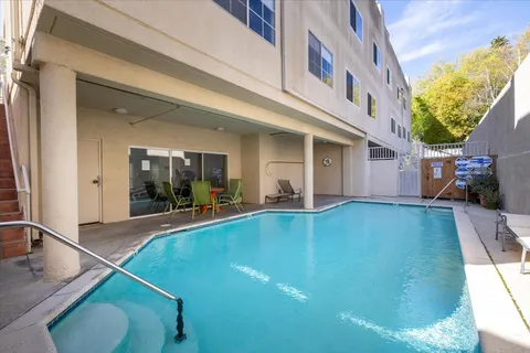 a view of a house with a swimming pool