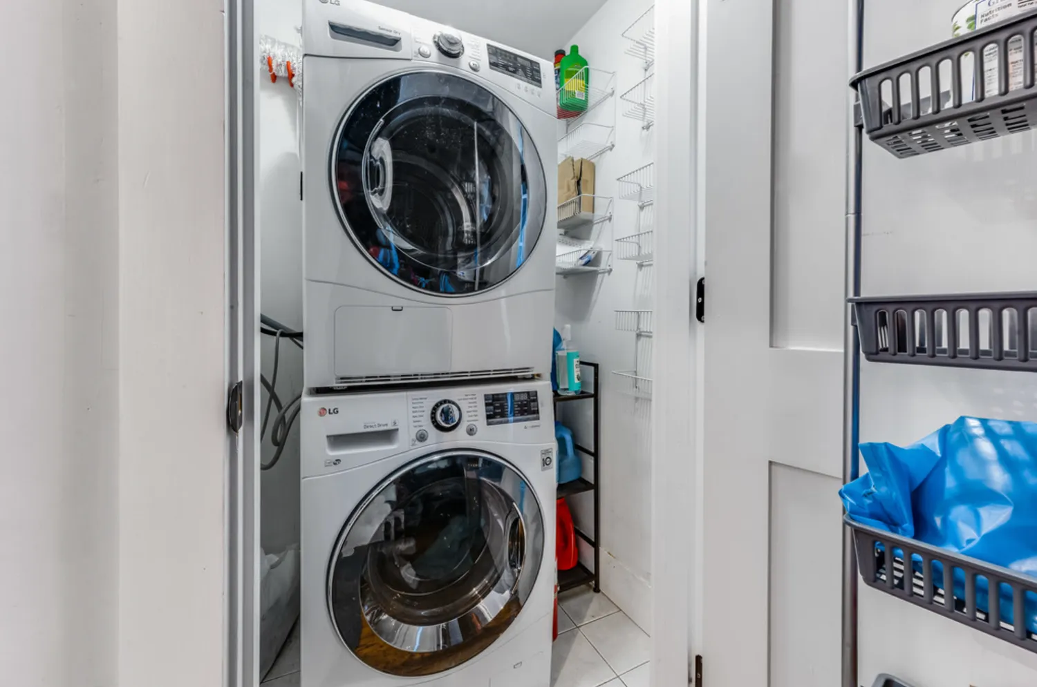 a view of a hallway with washer and dryer