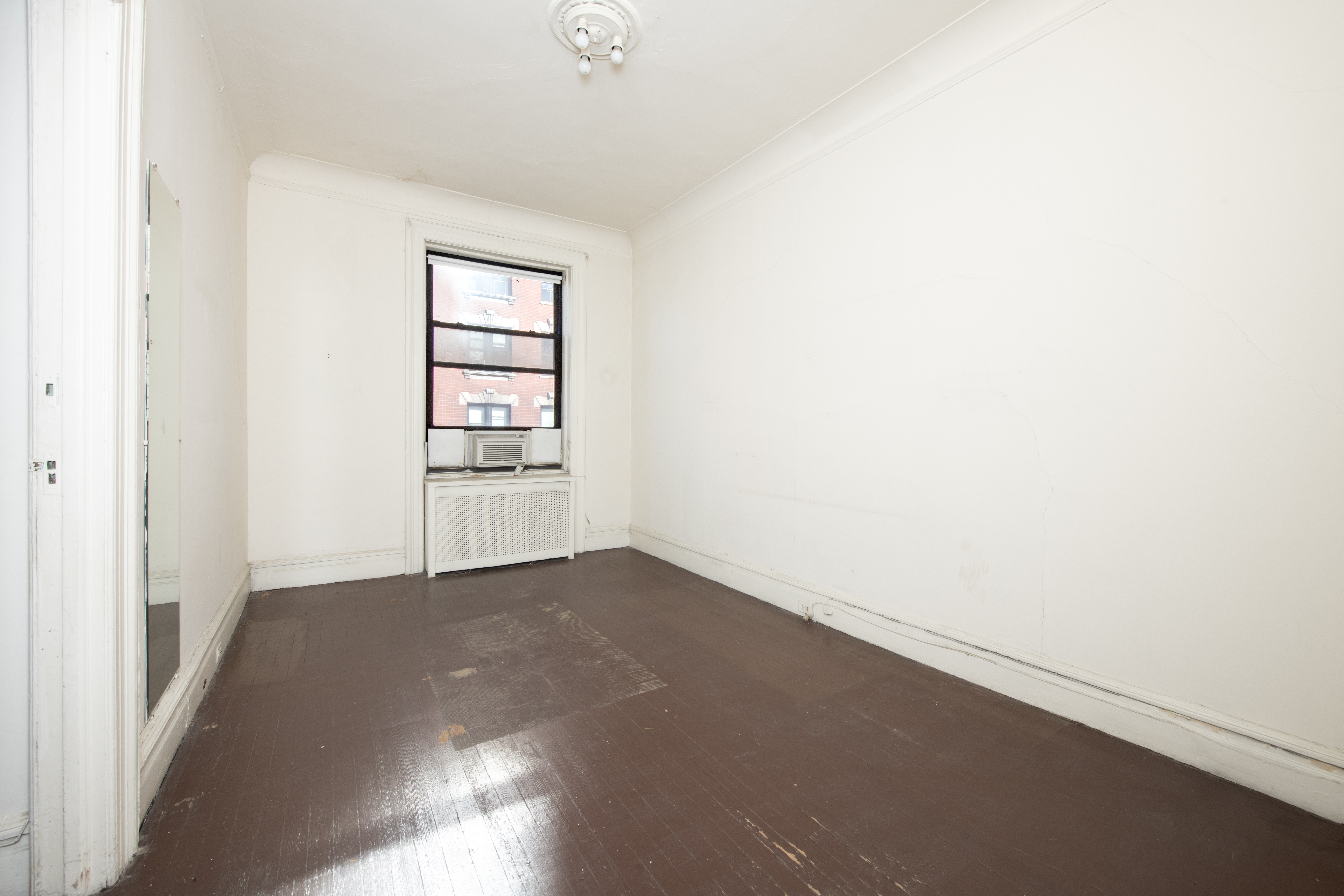 194 Riverside Drive, Unit 5E Manhattan, NY 10025 - Photo 15 of 26 an empty room with windows