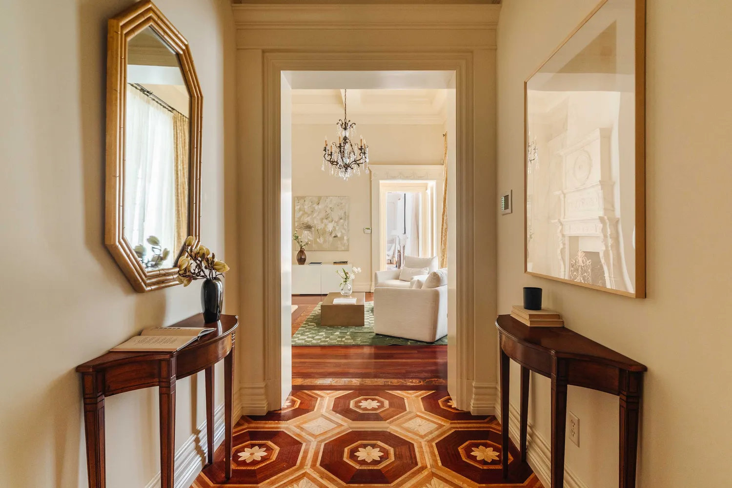 a view of an entryway with wooden floor