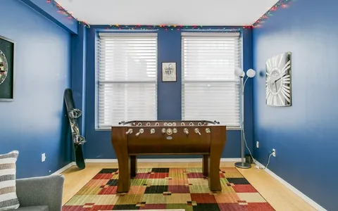 a living room with a couch and a table