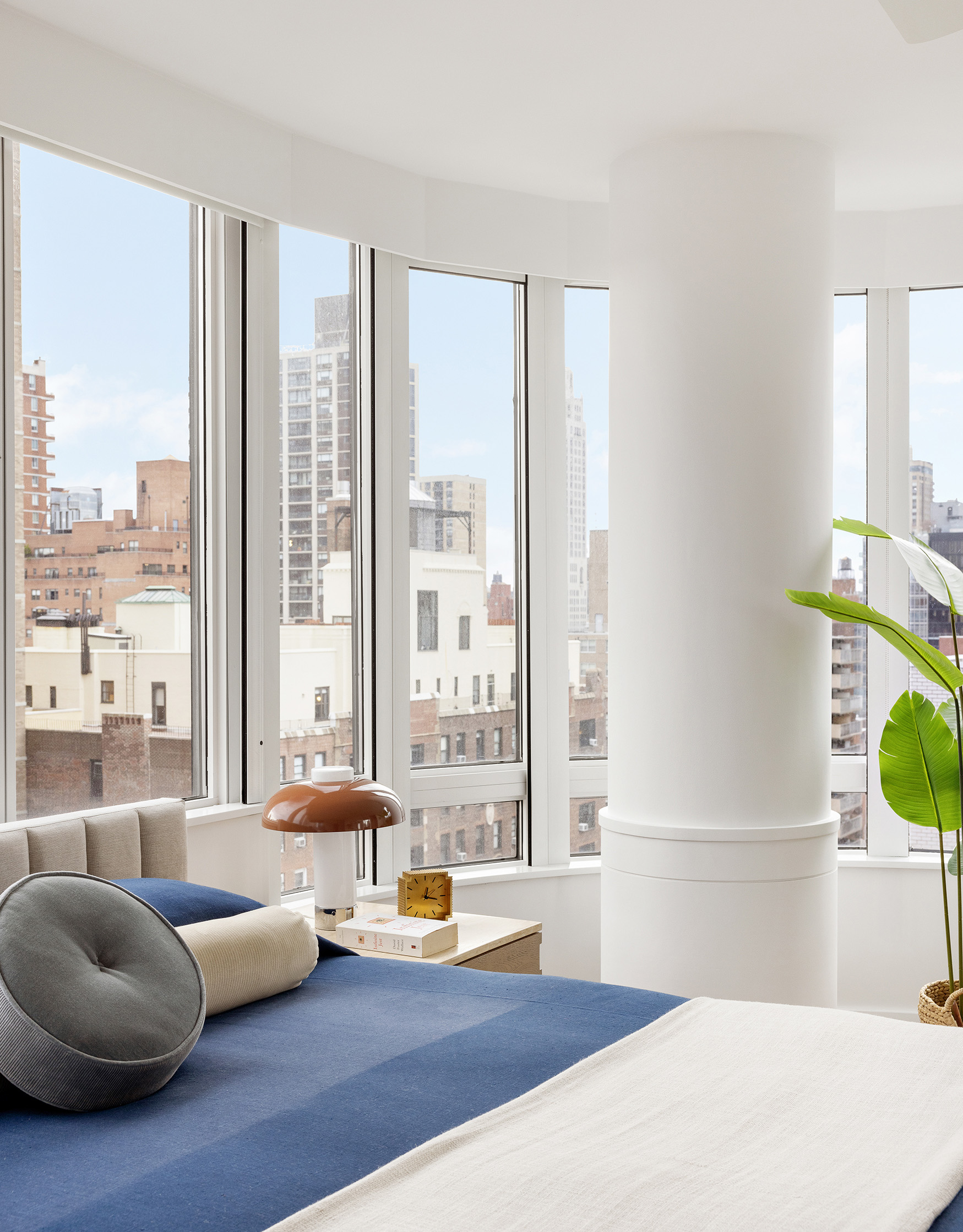 455 East 86th Street, Unit 20E Manhattan, NY 10028 - Photo 8 of 14 a living room with furniture and a large window