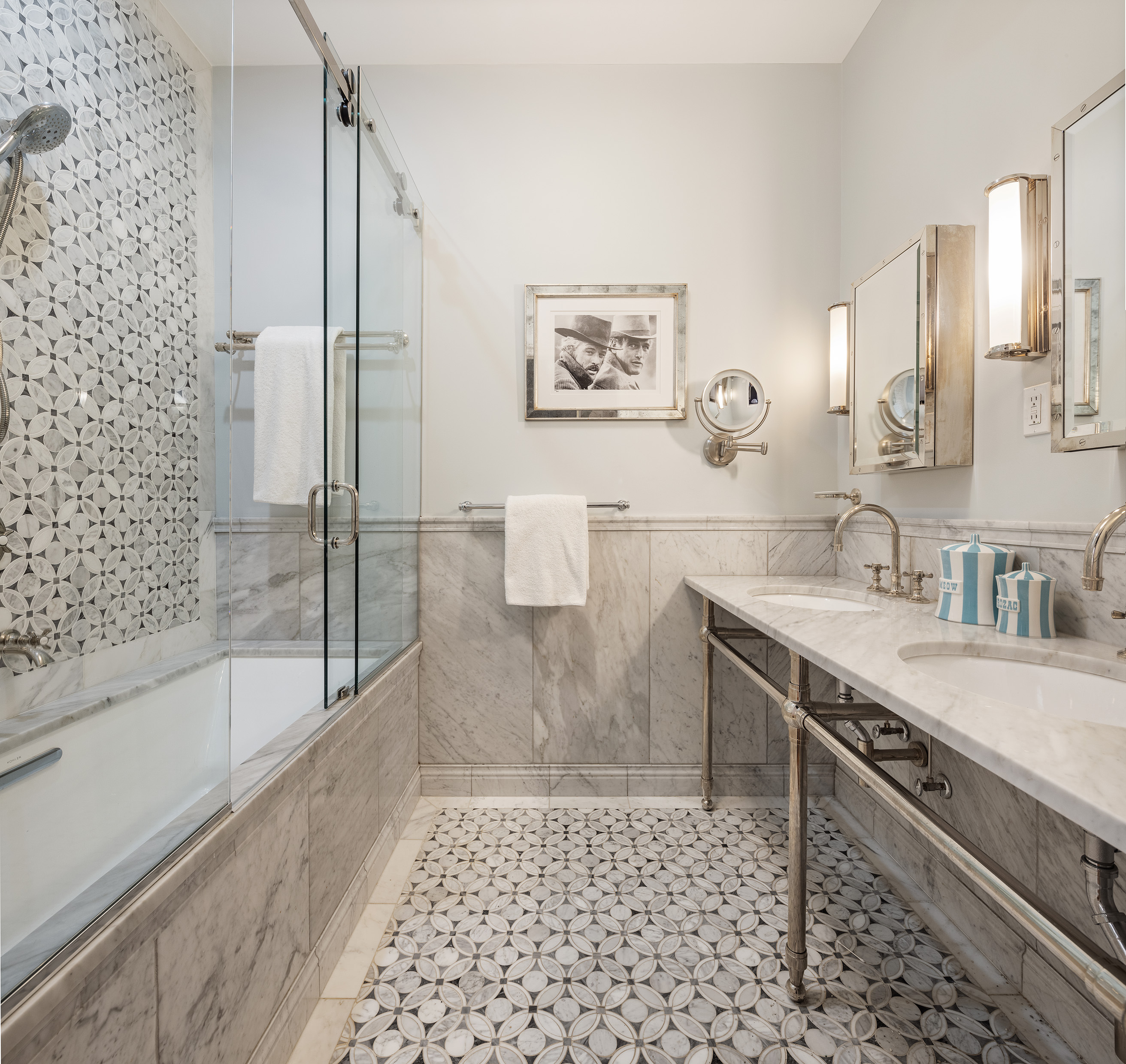 6 East 76th Street, Unit 3F Manhattan, NY 10021 - Photo 6 of 11 a bathroom with a granite countertop sink a toilet a mirror and shower
