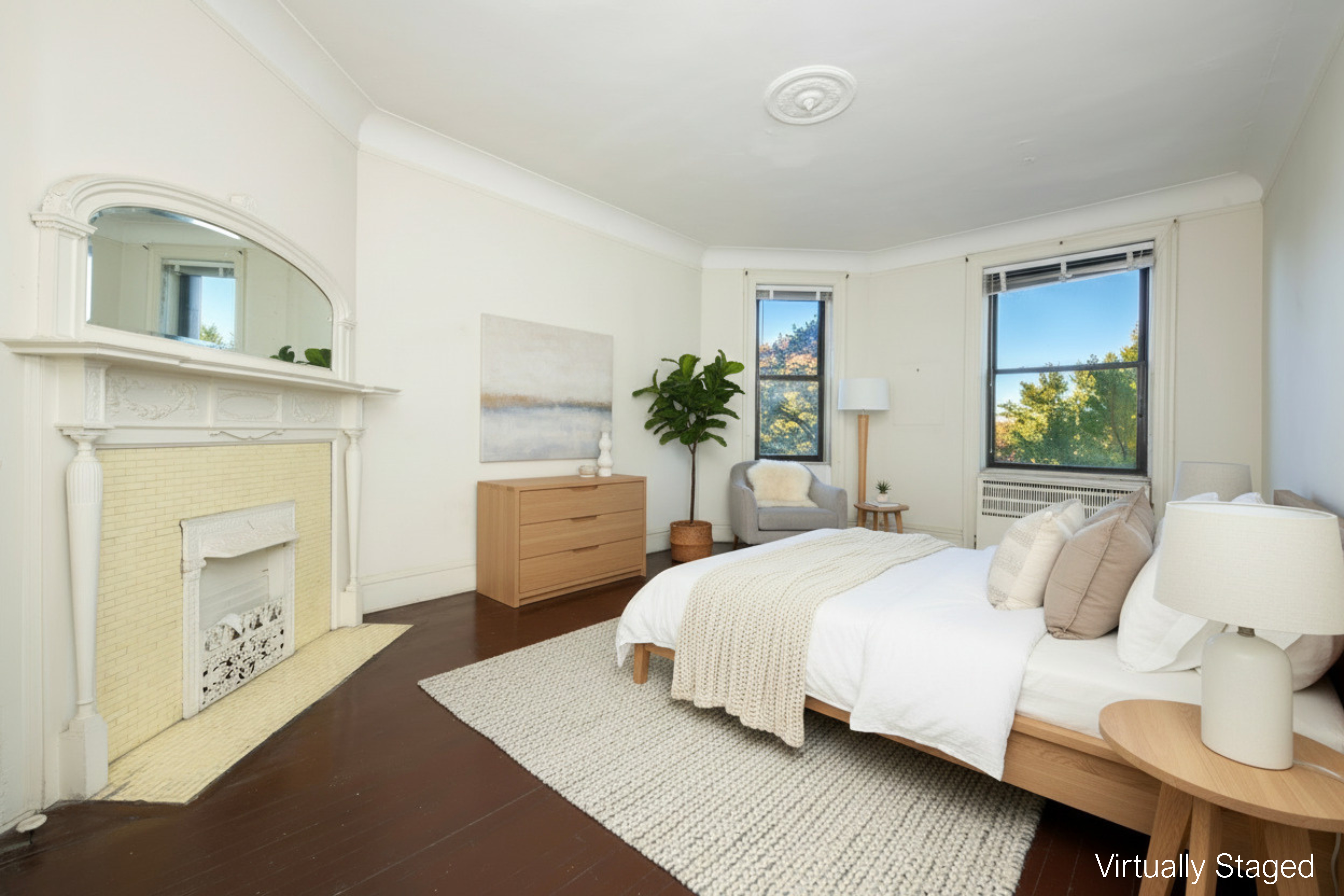 194 Riverside Drive, Unit 5E Manhattan, NY 10025 - Photo 8 of 26 a bedroom with a bed and a flat screen tv