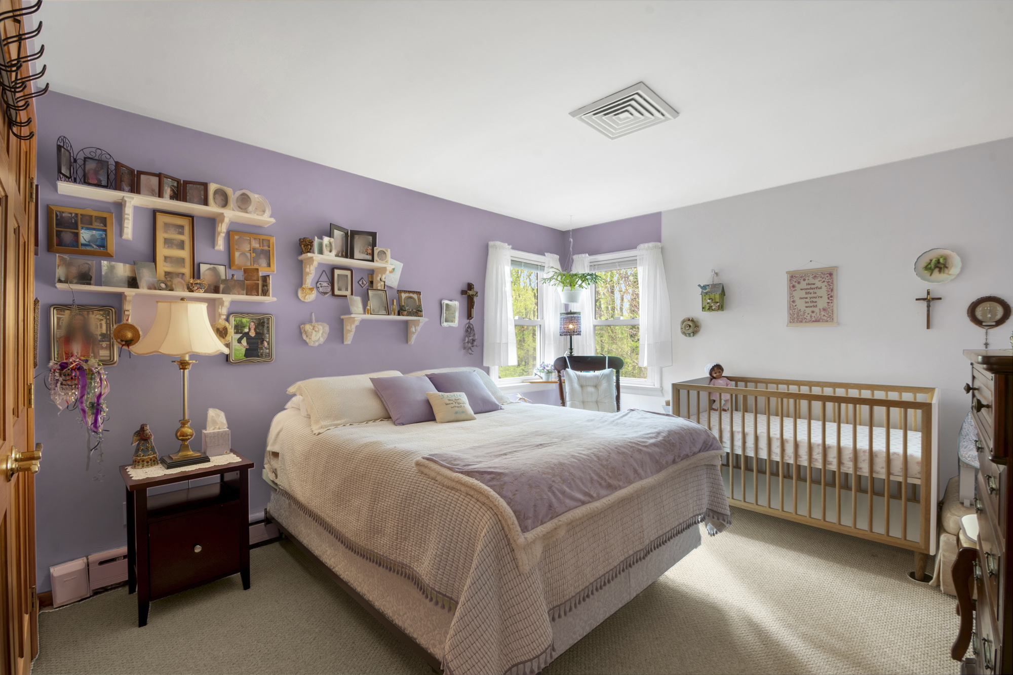 131 Jansen Street Staten Island, NY 10312 - Photo 10 of 21 a bedroom with a bed and a window